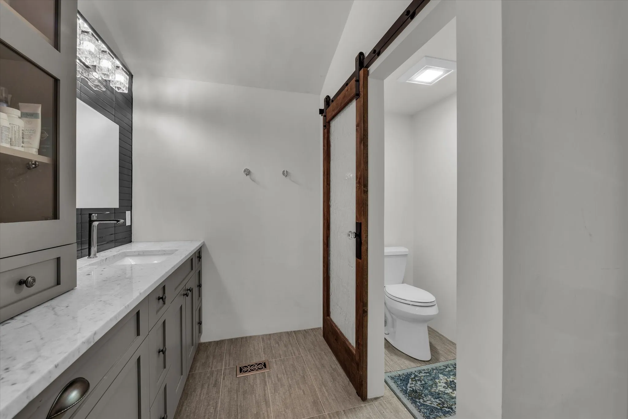Full bathroom with double vanity