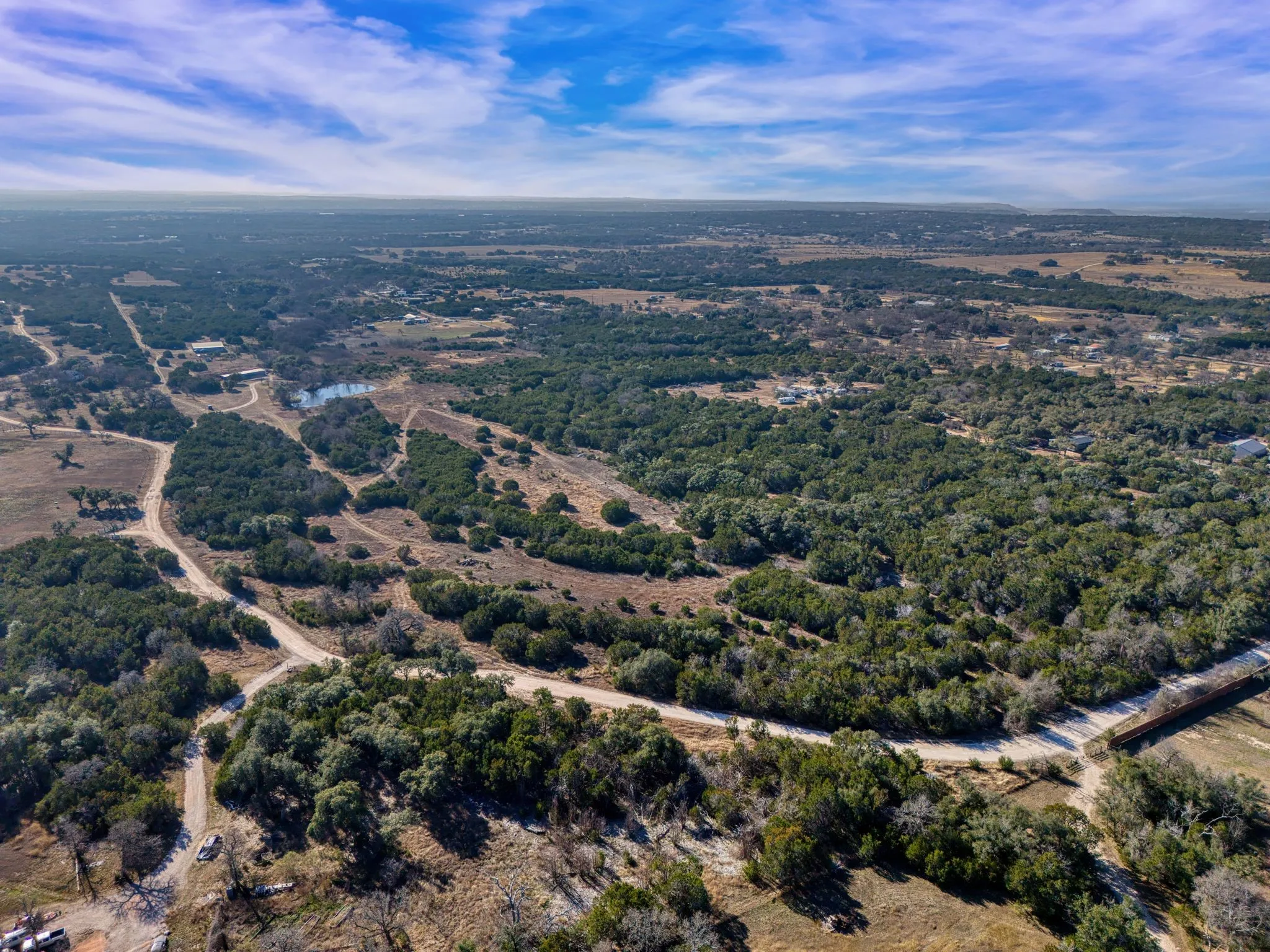 The property features extensive wooded areas