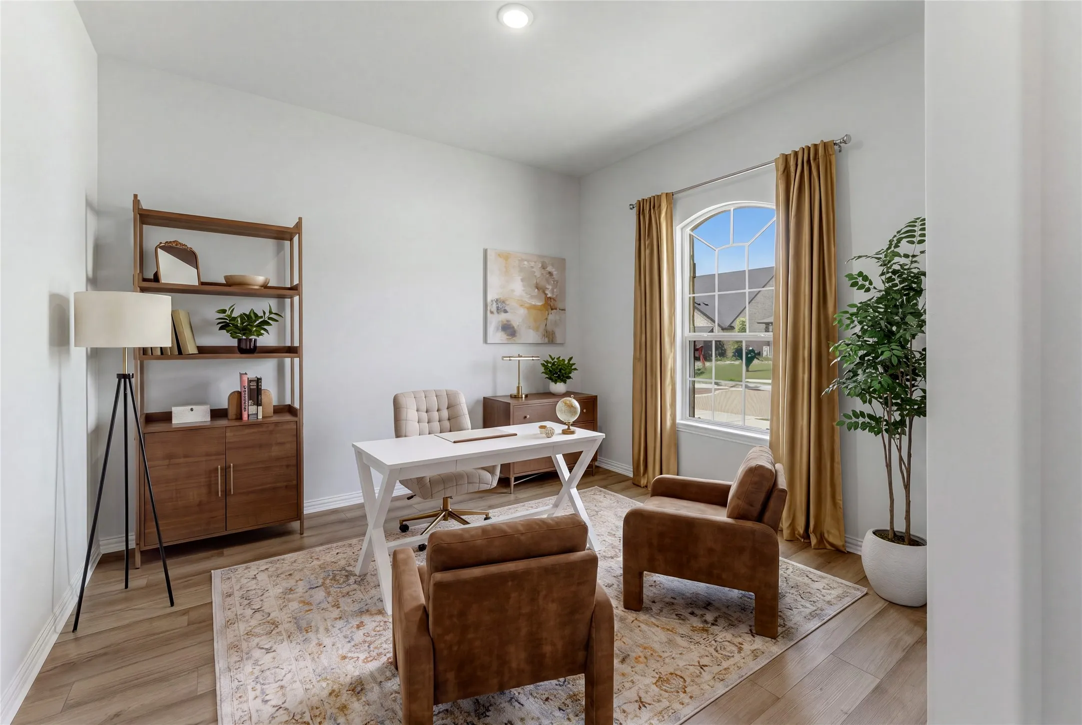 Recessed ceiling lighting, wood-finish flooring, arched window, and smooth wall finishes
