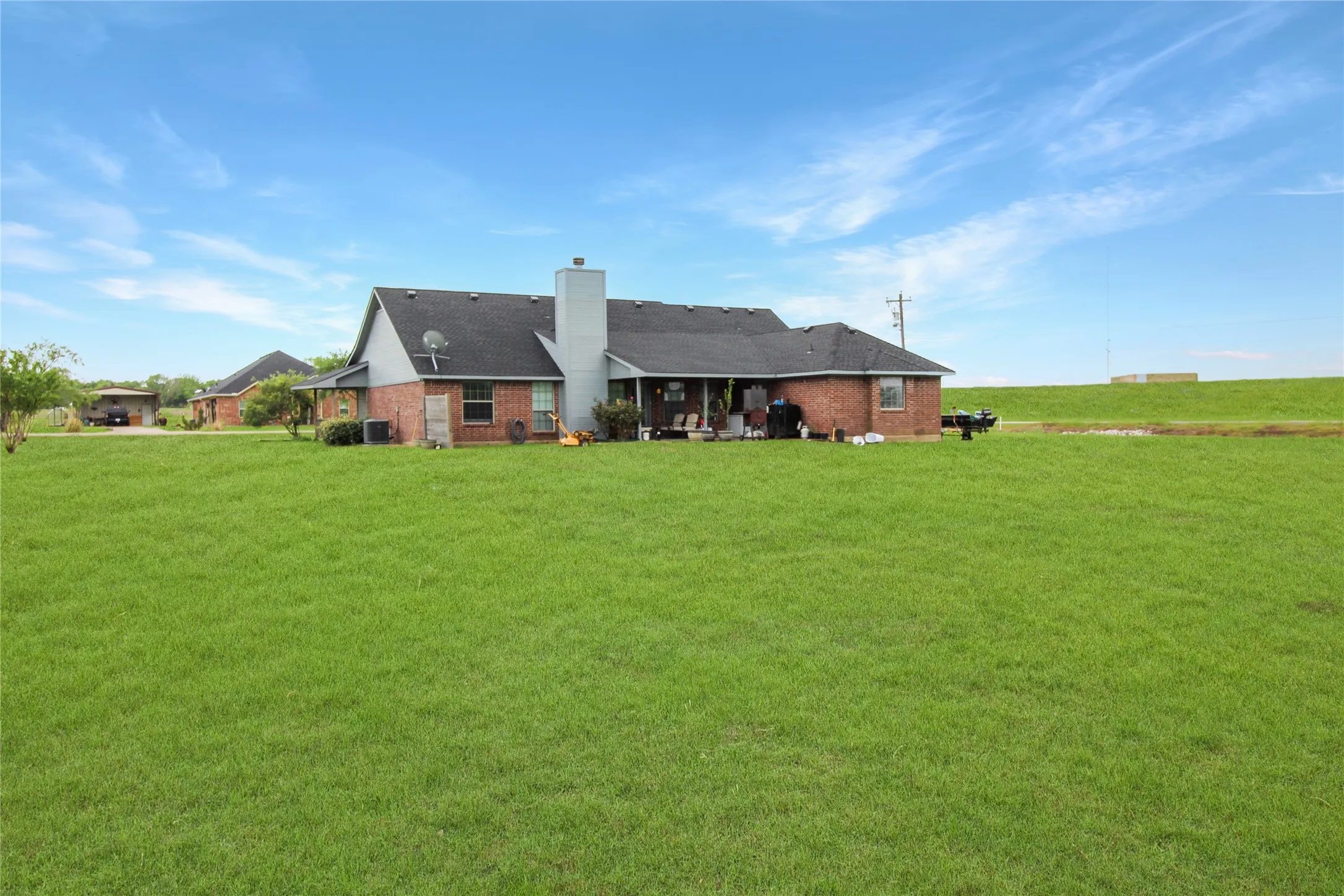 Expansive green lawn providing abundant outdoor space