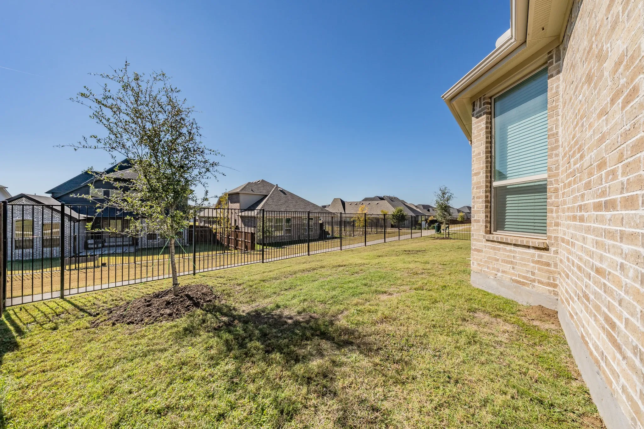 View of yard featuring a residential view