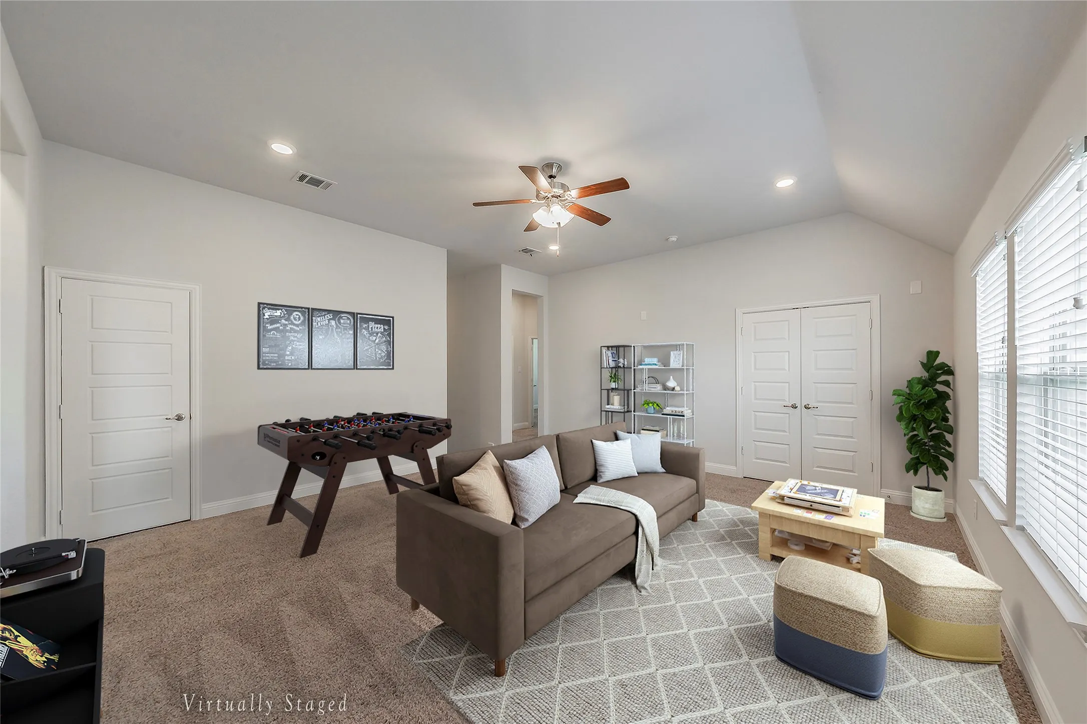 Virtually Staged -Carpeted living room with vaulted ceiling, recessed lighting, and a ceiling fan