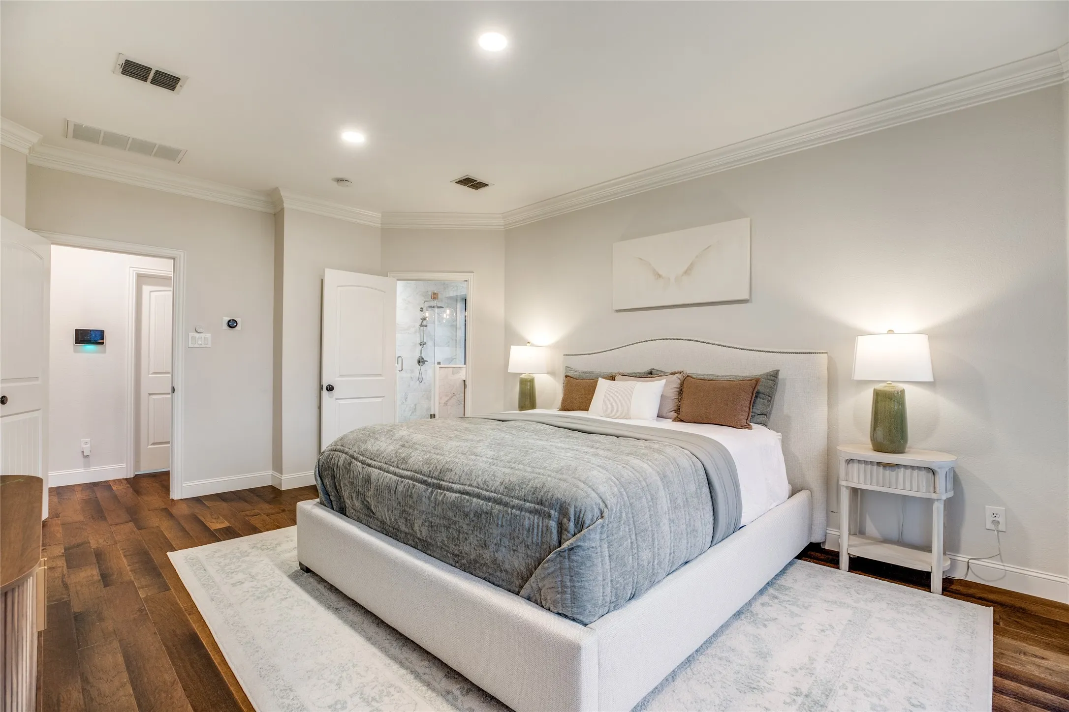 Bedroom featuring hardwood floors, recessed lighting, and crown molding