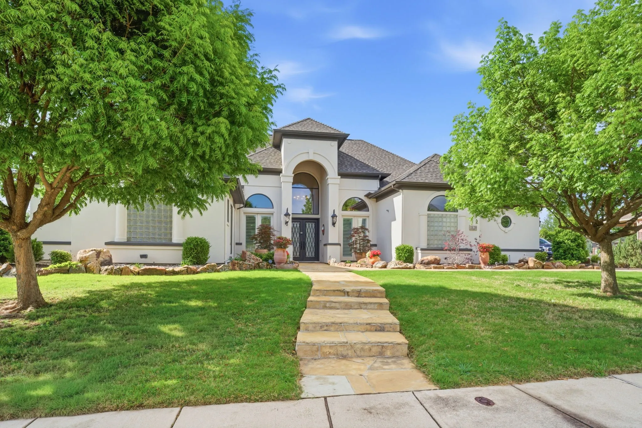 Set back from the street & surrounded by mature landscaping, the property creates an immediate sense of exclusivity while still being conveniently close to top amenities. Great curb appeal to come home to every day!