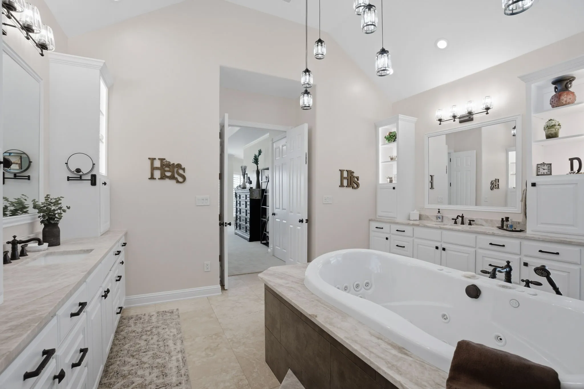 Equally impressive storage towers for your linens & toiletries. More Travertine floors.