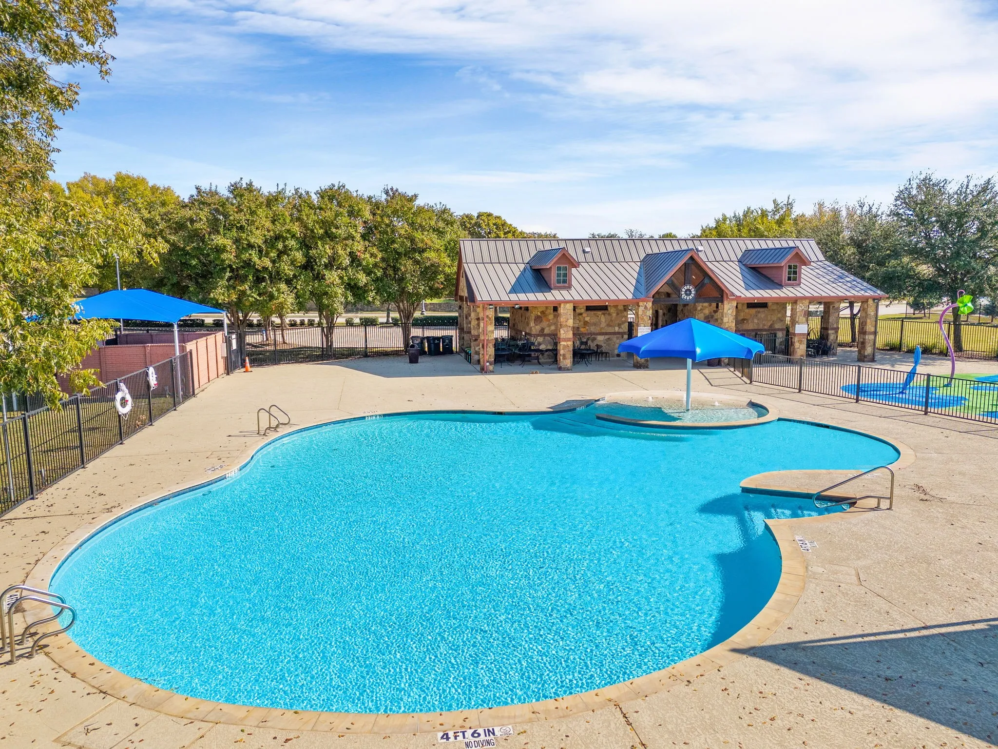 The second community pool & community center for residents & their guests to use.