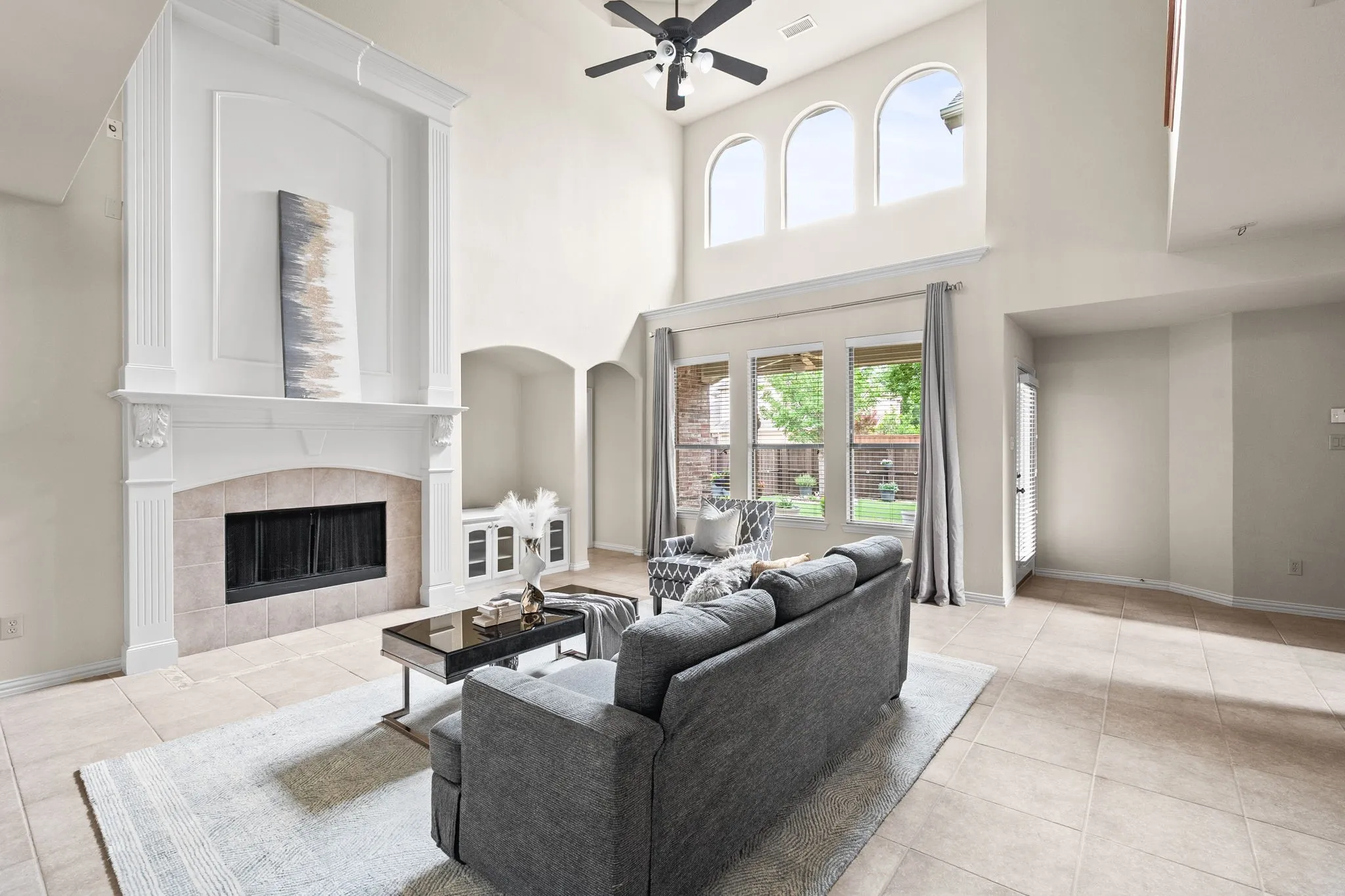 Large family room with primary suite to the right.