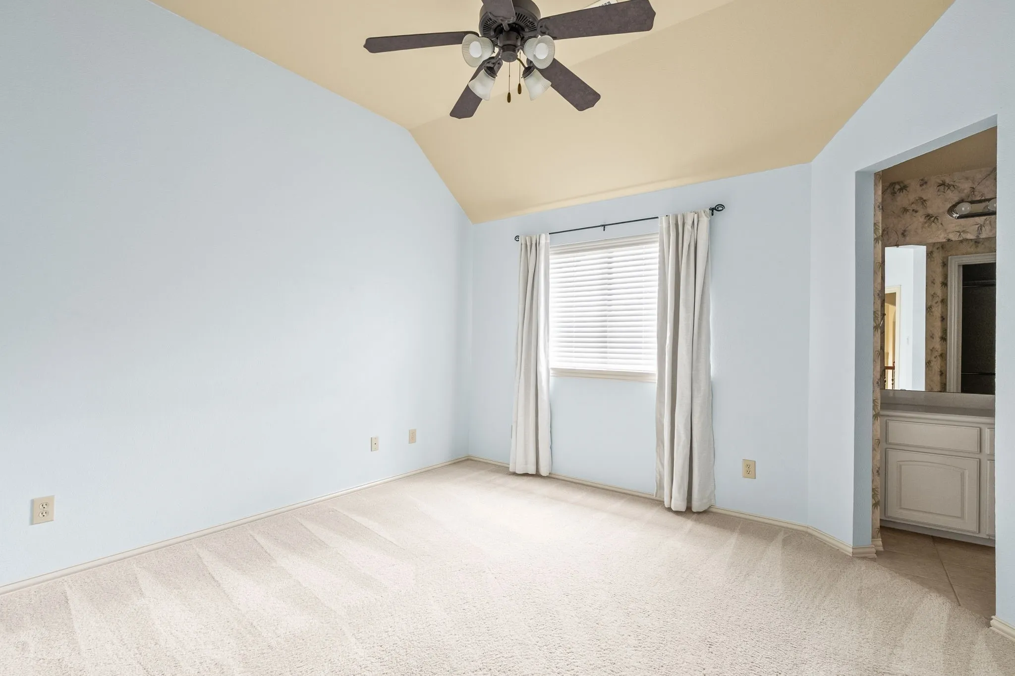 Upstairs bedroom with connecting bathroom.