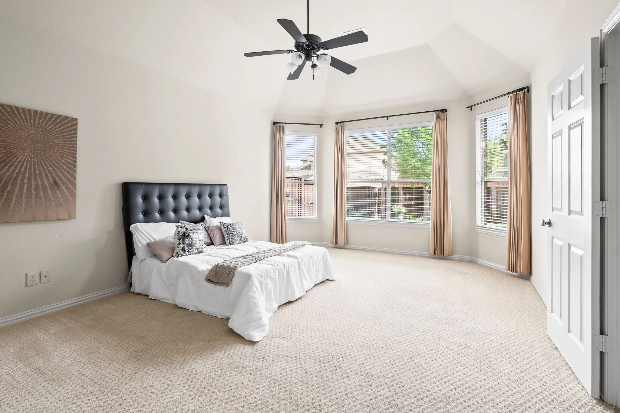 Oversized primary suite with natural sunlight.