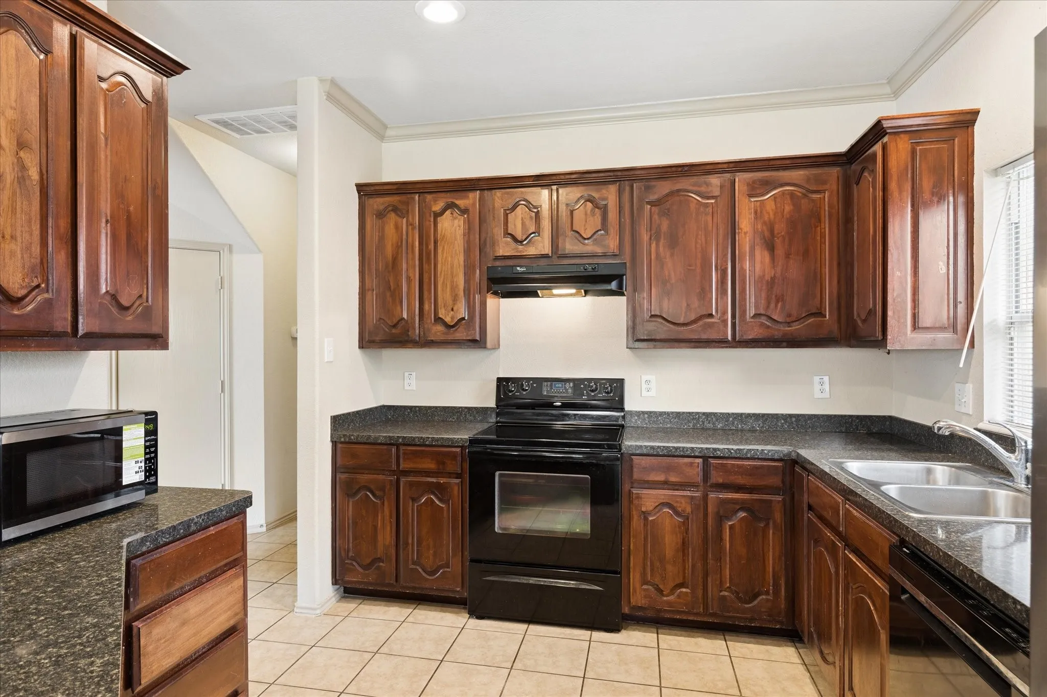 Kitchen has lots of counter and cabinet space.