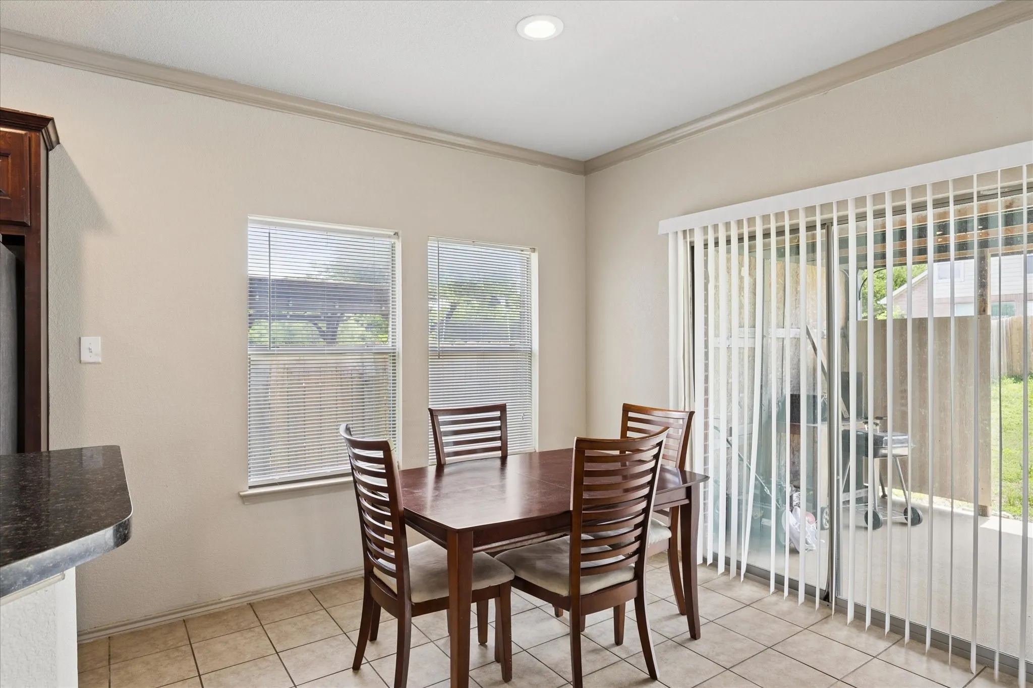 Dining area with sliders to the covered patio.