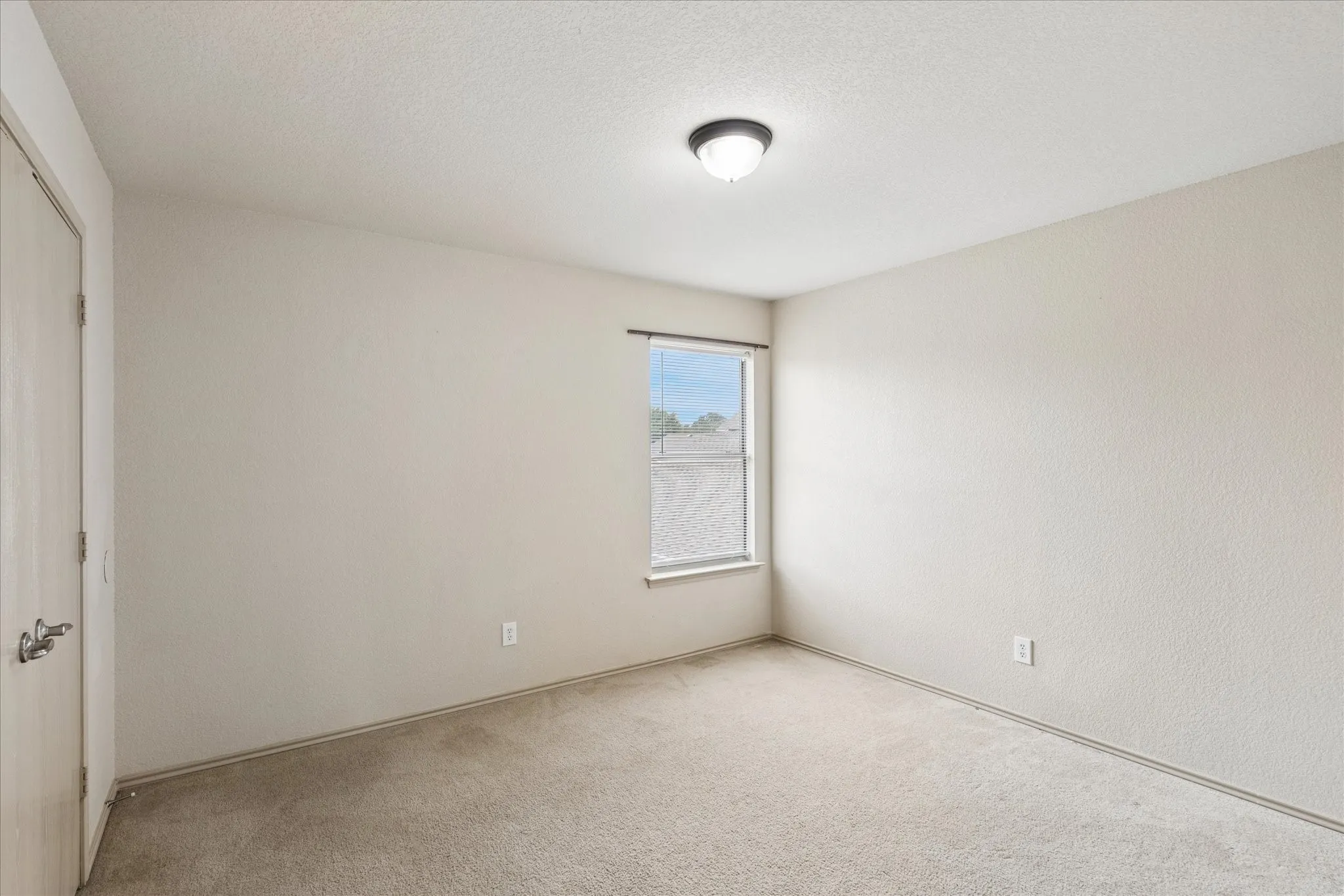 Bedroom No. 3 with double closet doors.
