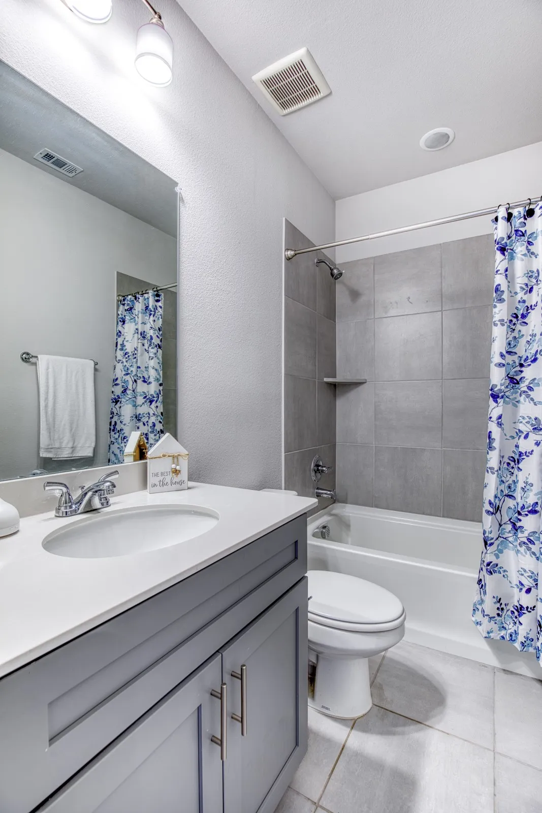 Secondary downstairs full bath with tub/shower combo.