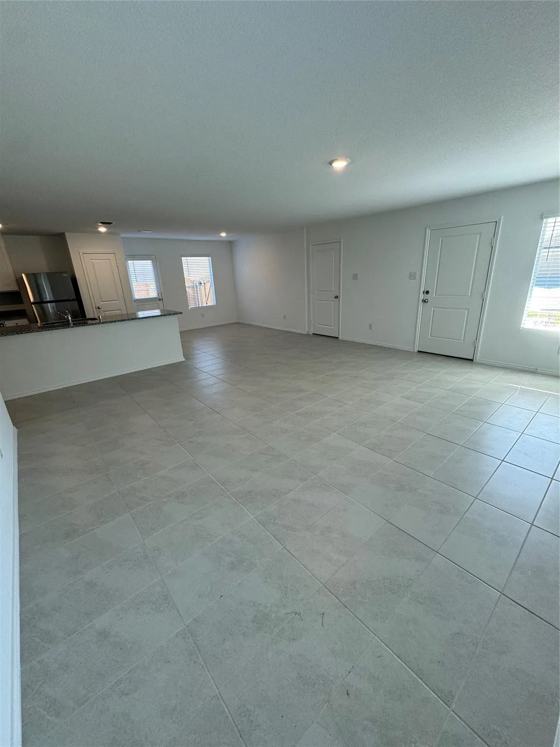 Open-concept living area with separate breakfast nook