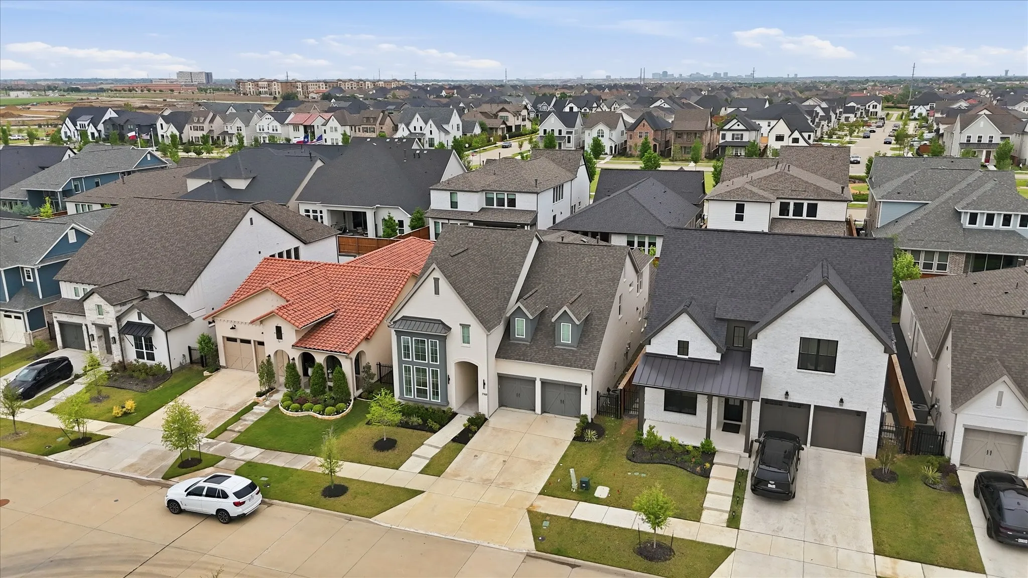 The property is located in a community featuring various architectural styles, with well-maintained homes and landscaping