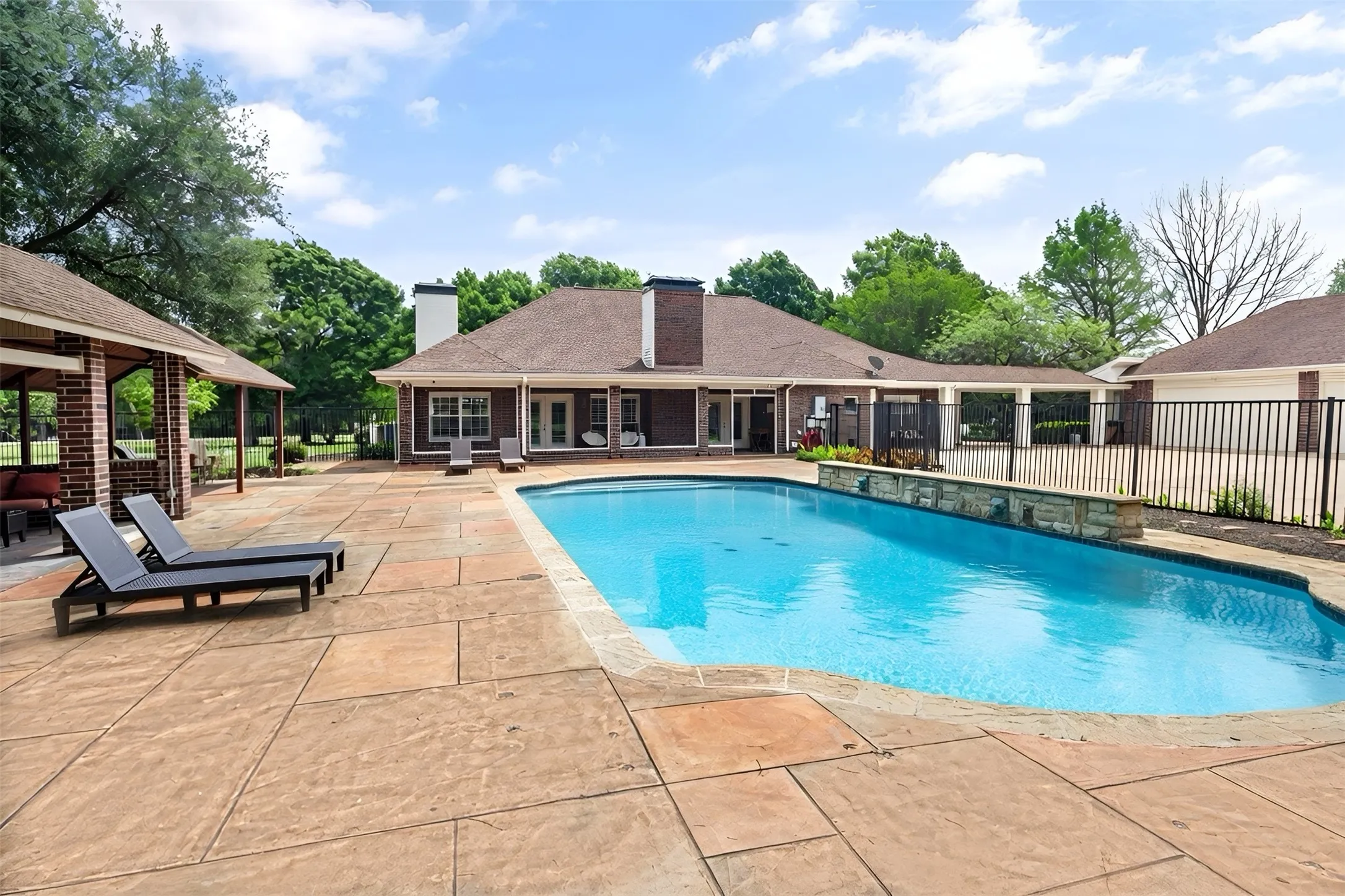 Outdoor living area and oversized pool.