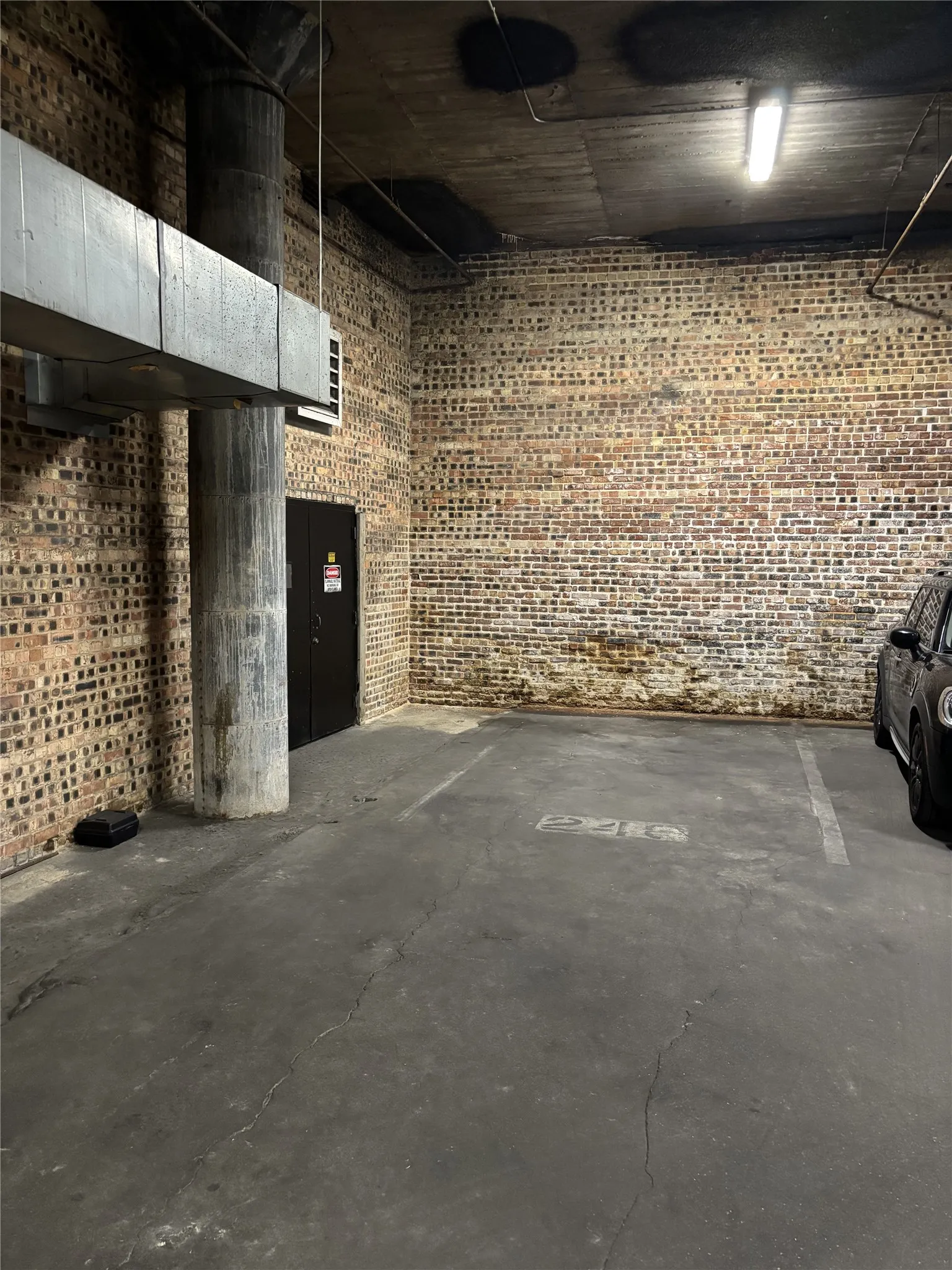 Designated parking space in the building's private parking garage