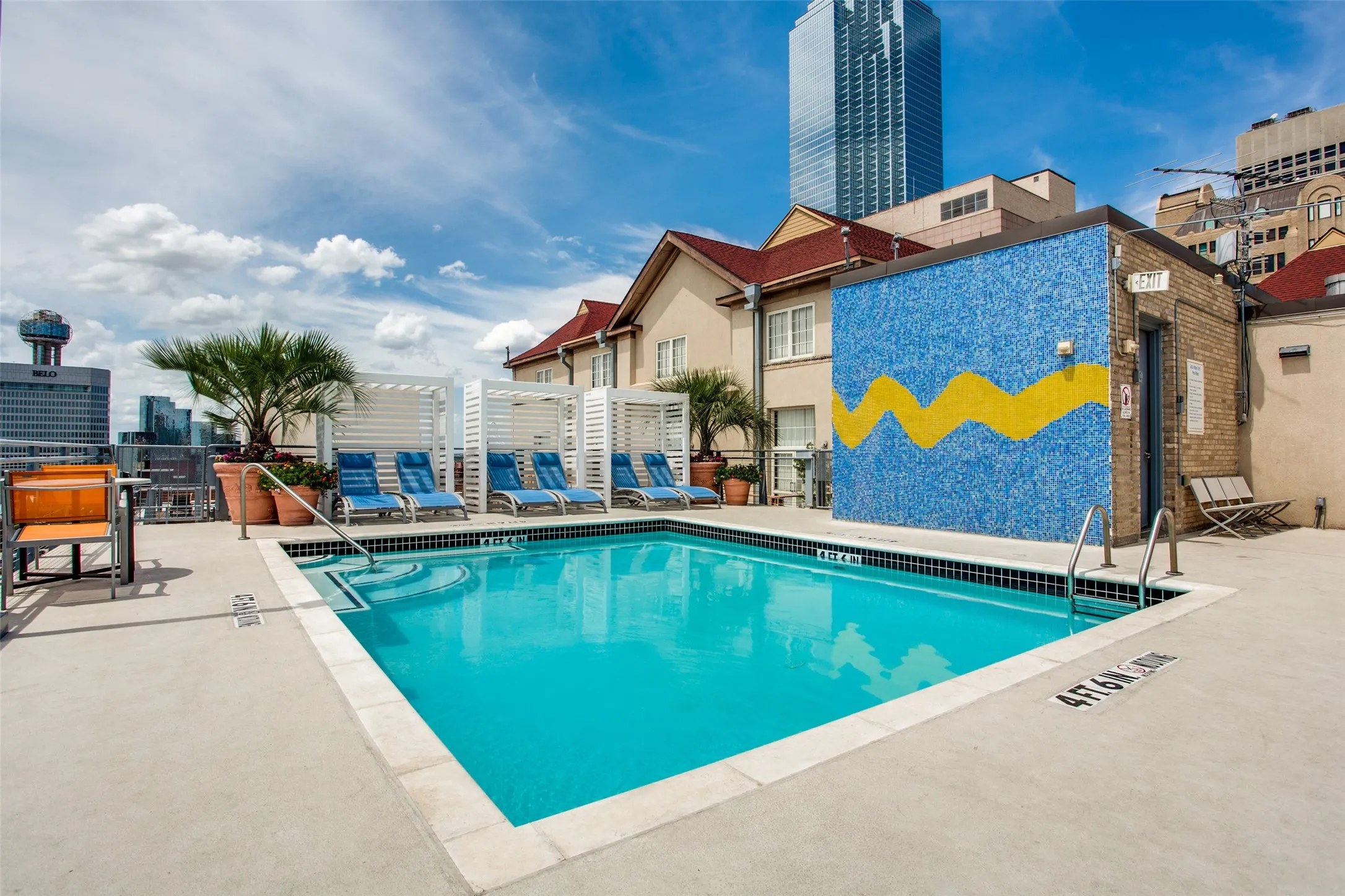 Monthly HOA dues cover the pool, gym, parking, storage, PLUS water, trash, internet, concierge services, and on-site management for easy, low-maintenance living.