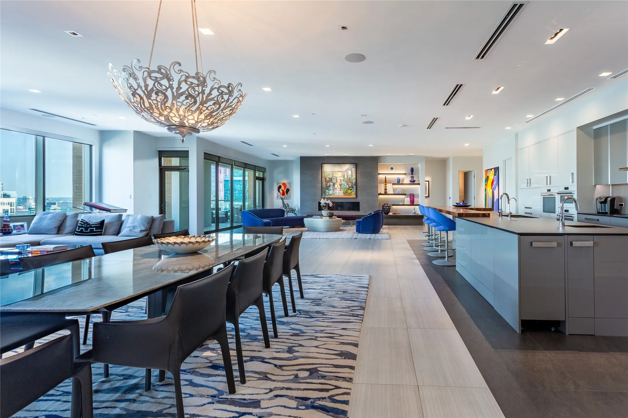 Porcelain Flooring throughout. Designer Dining chandelier.
