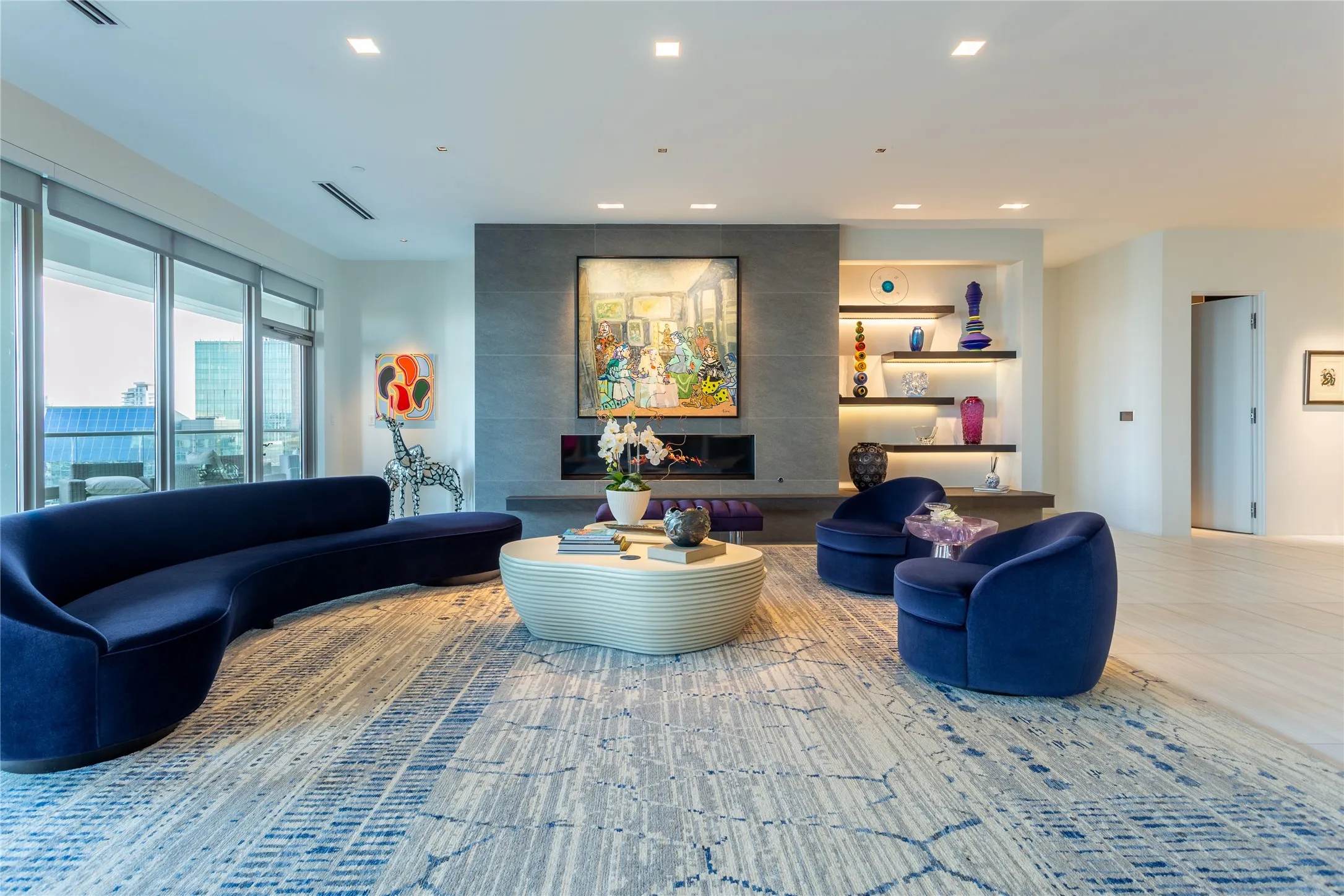 Living Room access to large protected Balcony.