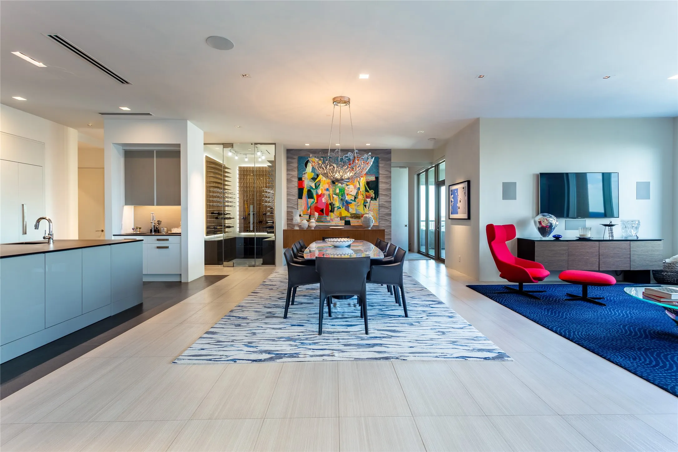 A 10-person dining area flanked by the Kitchen and the Media area