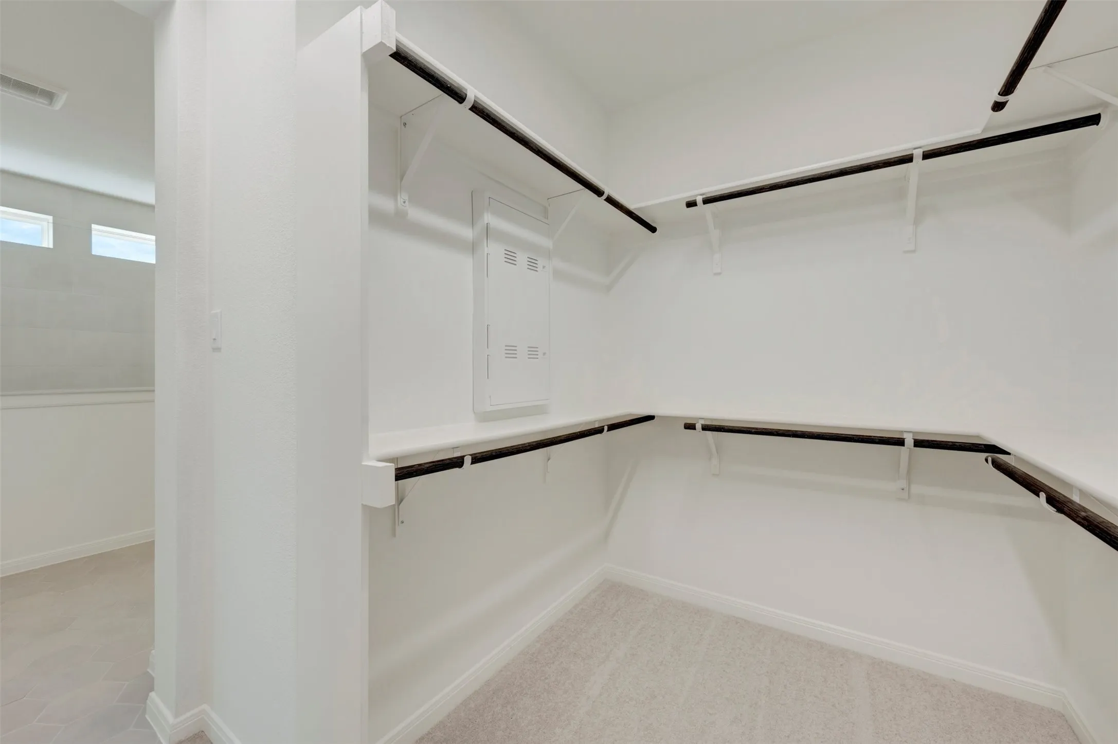 Built-in closet shelving and hanging rods