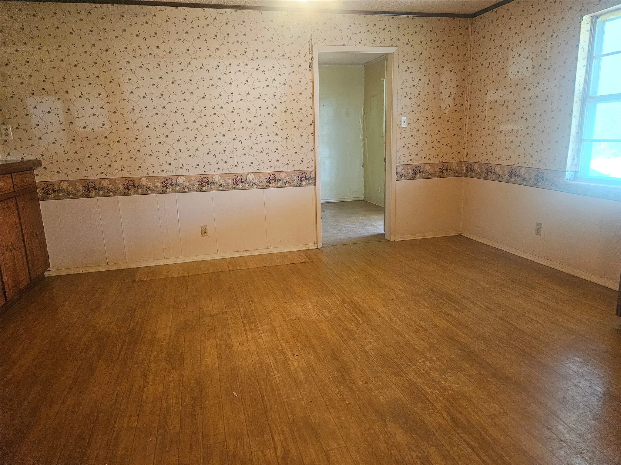 Dining area, leads to the large laundry room and oversized garage