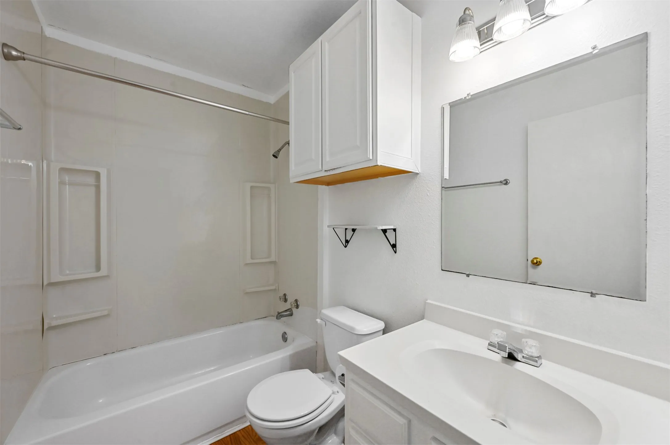 Full bathroom with shower / bathtub combination, vanity, and toilet