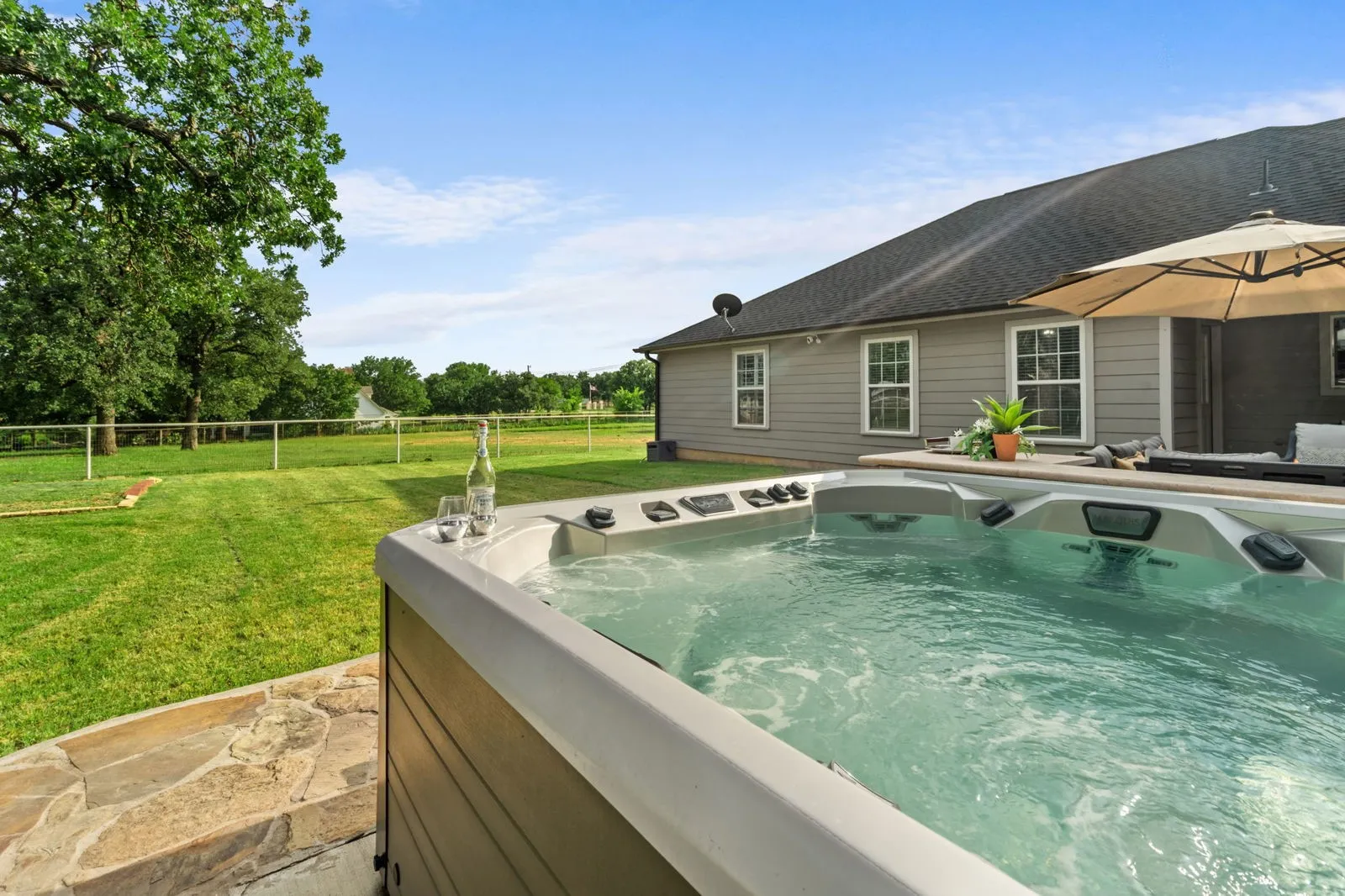The hot tub will convey with the sale of the home.