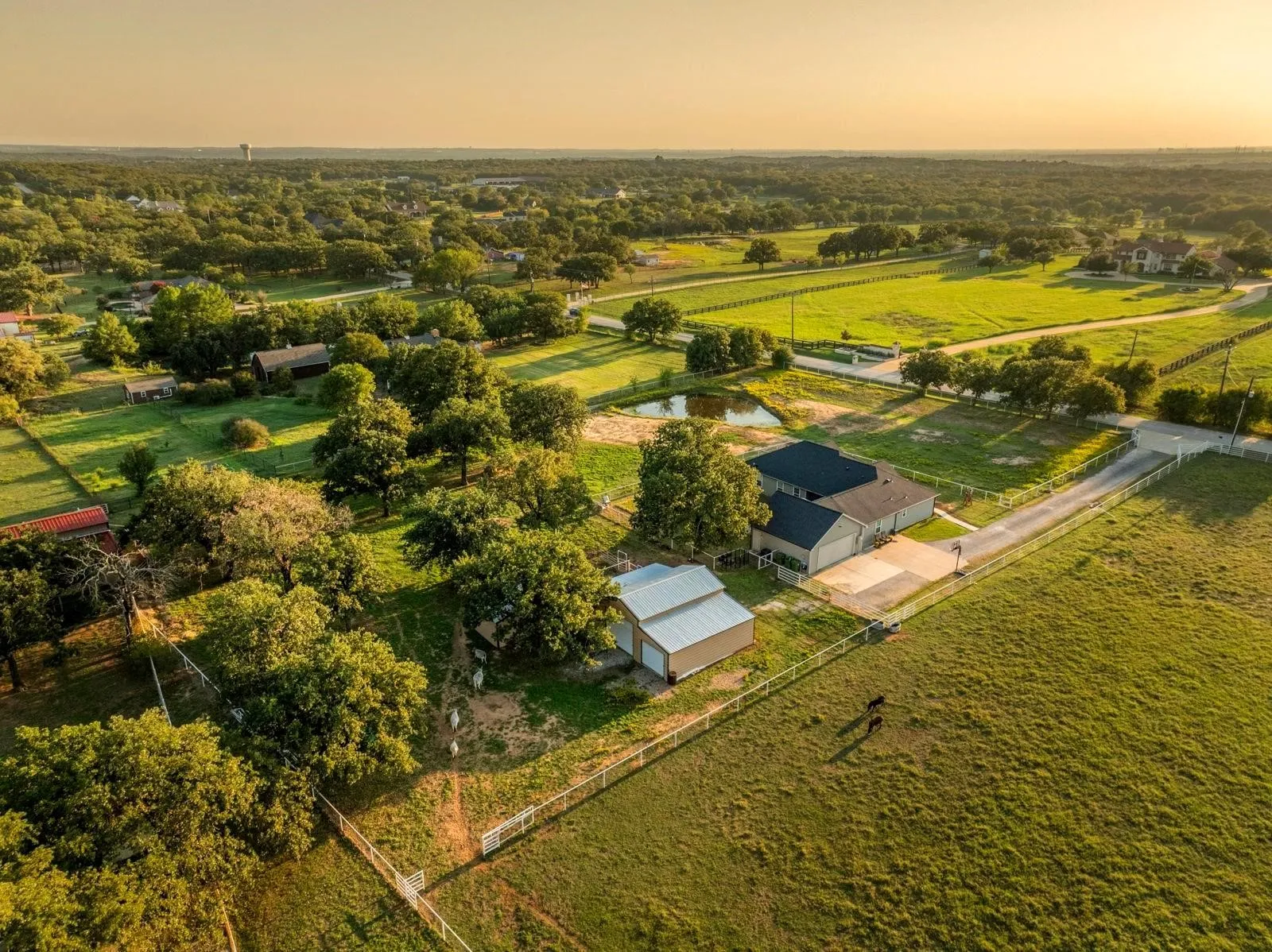 Where the sky stretches wide, animals roam happily & there is space to breathe. Nestled on 2.152 breathtaking, tree-filled acres in Denton County, with 1.652 acres AG exempt, this enchanting property represents not just living, but belonging.