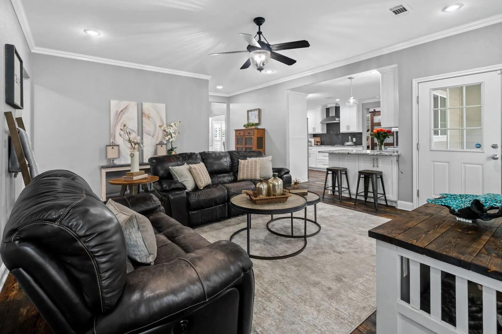 Spacious living area with an open, welcoming layout that flows seamlessly into the kitchen.