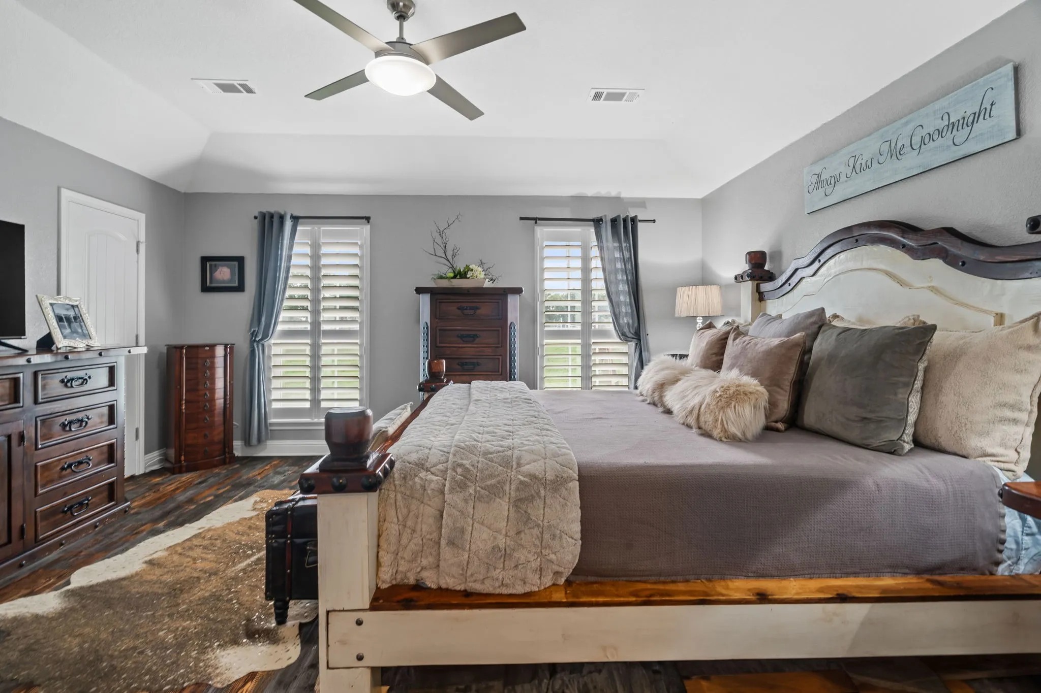 Peaceful, tucked-away retreat with serene property views and a spacious bedroom layout with room for a sitting area.