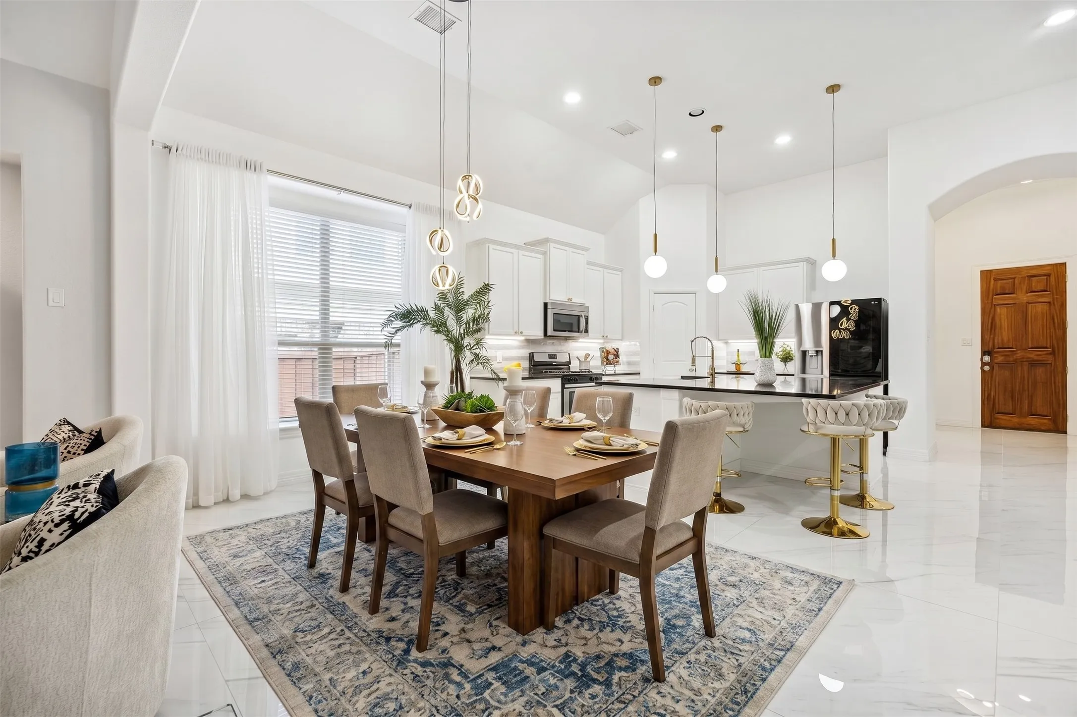 Everyday meals, casual hosting, and weekend brunch all feel easy in this open dining and kitchen space.
