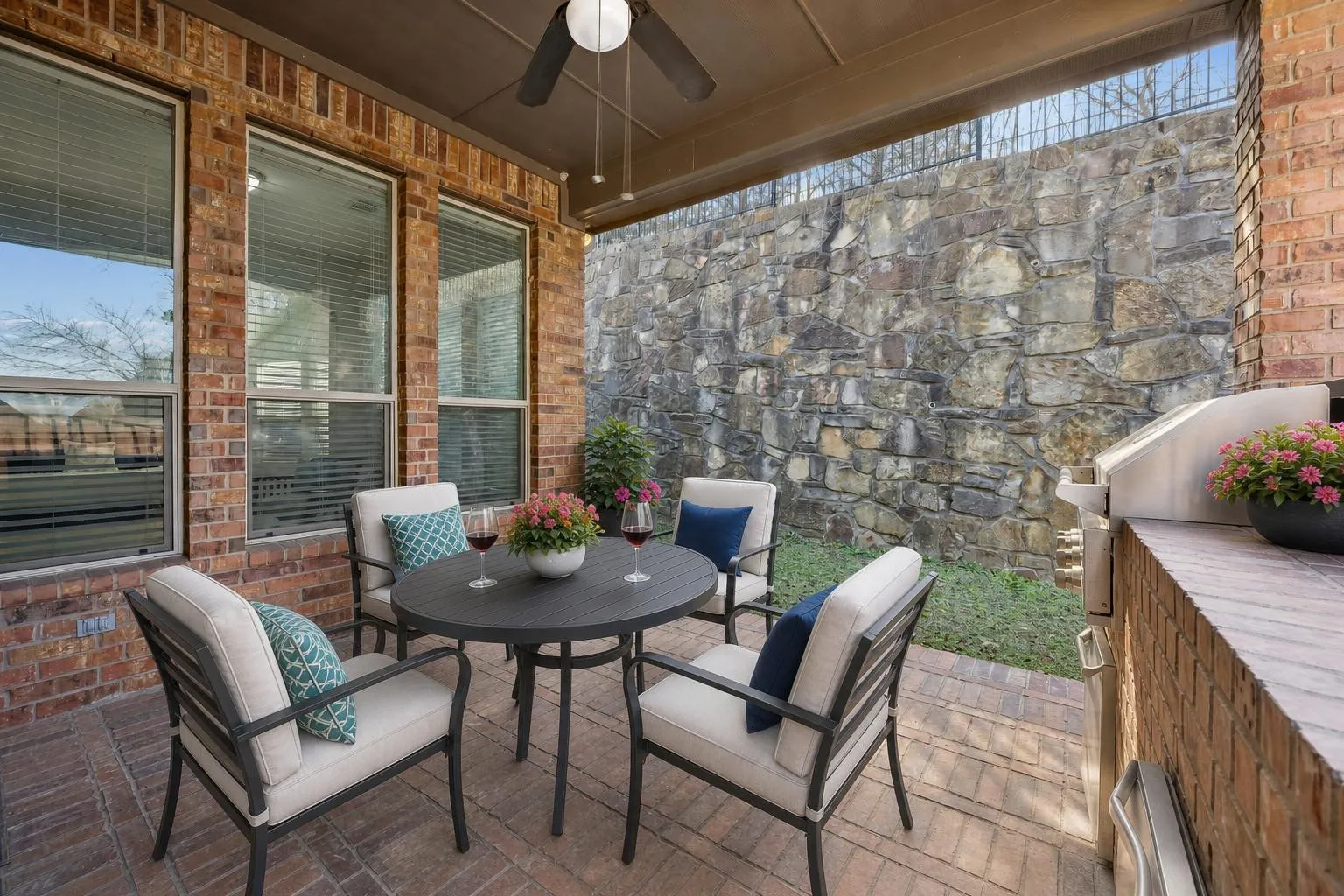 The outdoor kitchen expands your living space without adding weekend yard work.