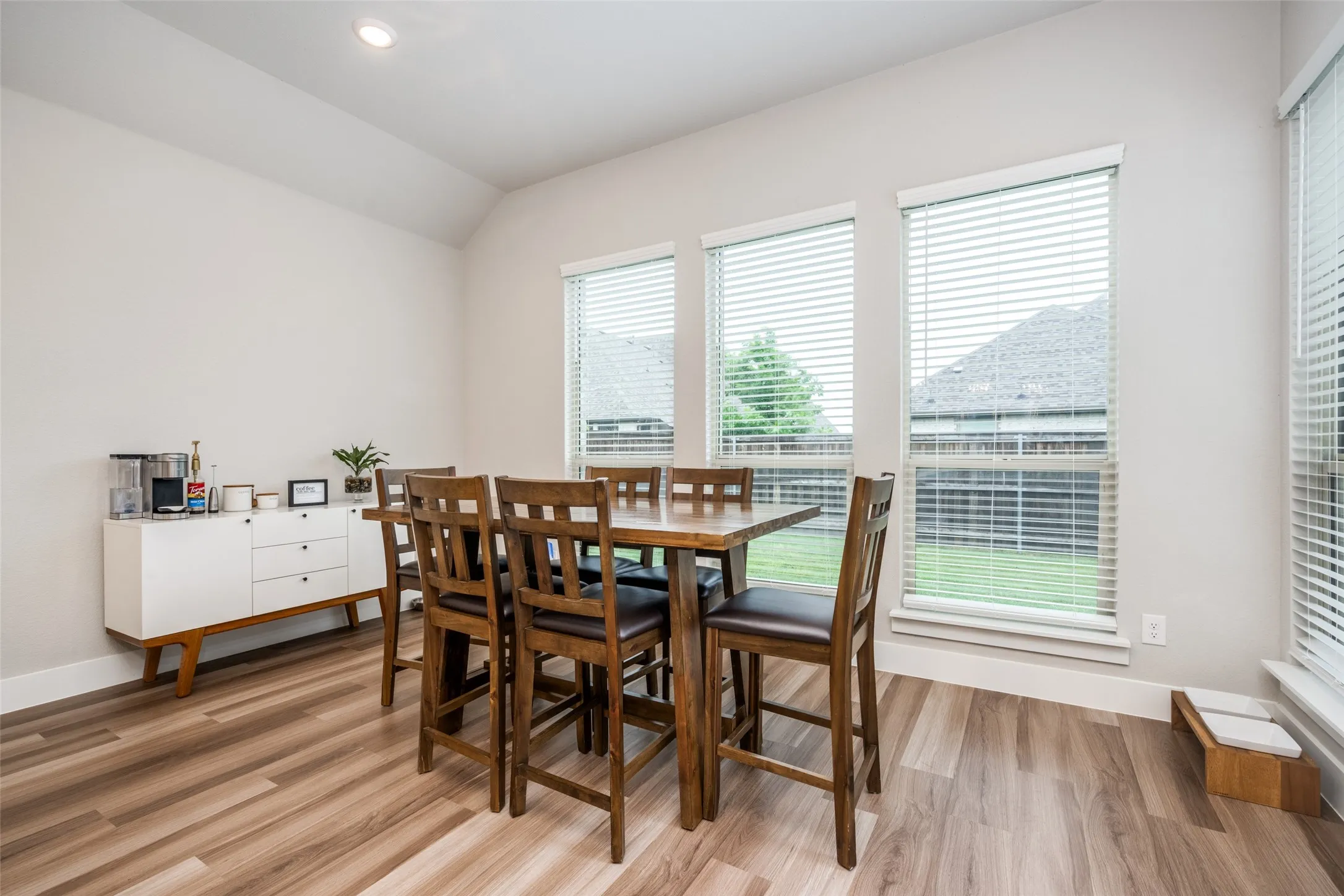 The kitchen dining space is great as a breakfast nook, but large enough for your main dining table as well.