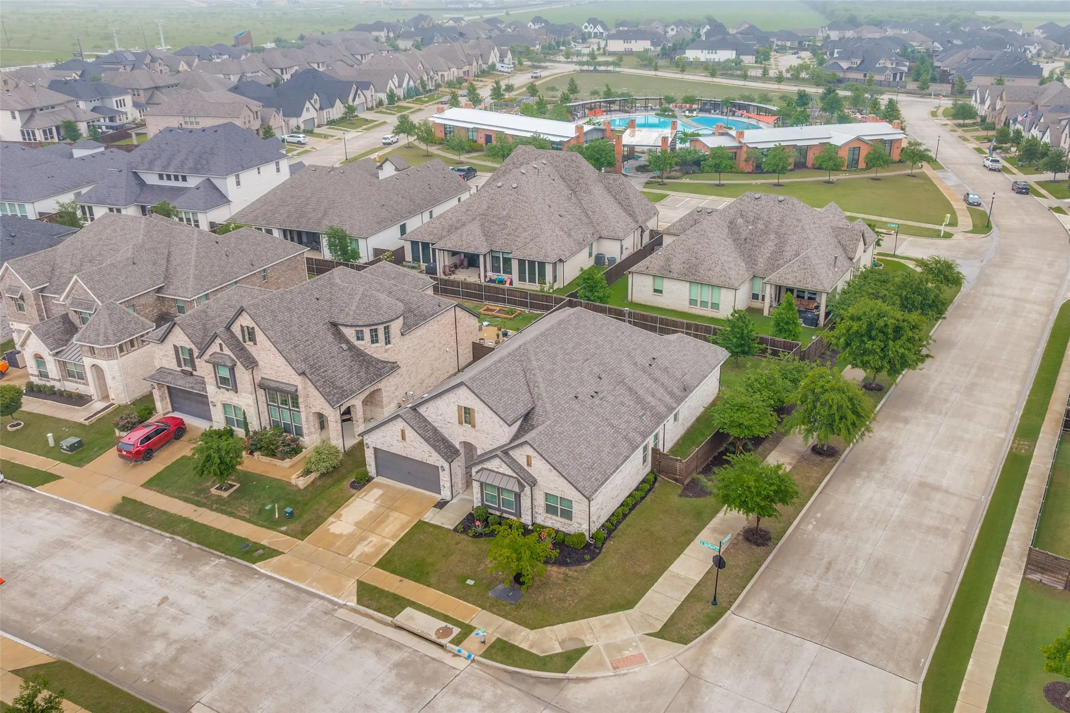 Aerial perspective of the perfect corner lot, just a block from the amazing amenities center.