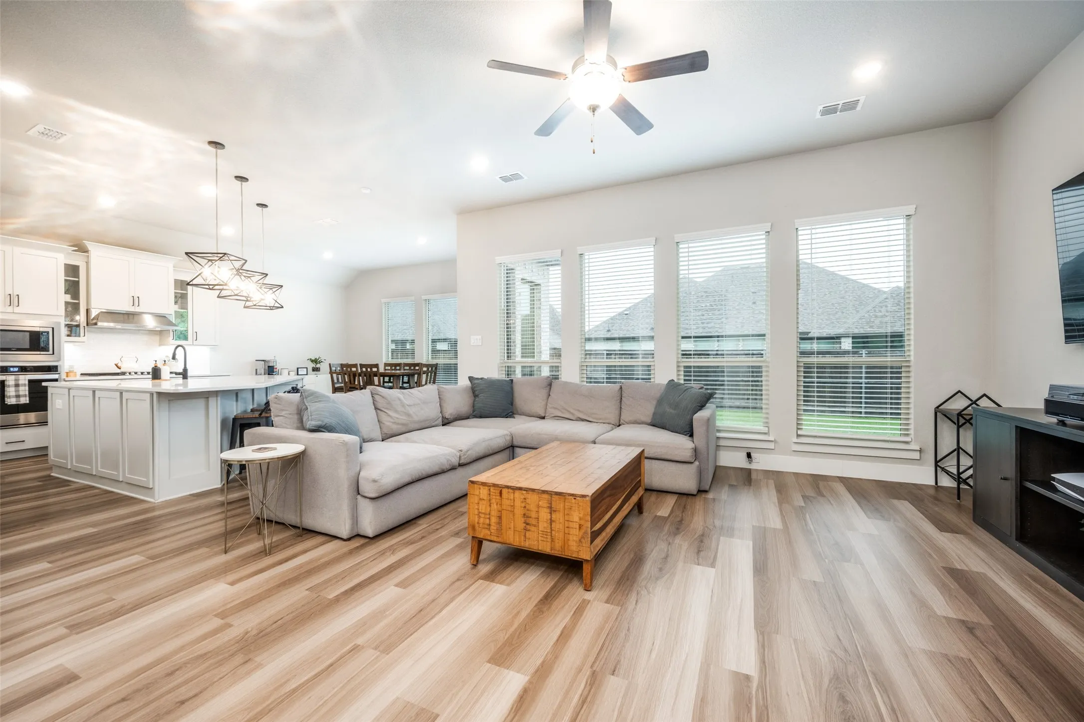Open-concept living space with beautiful LVP flooring.
