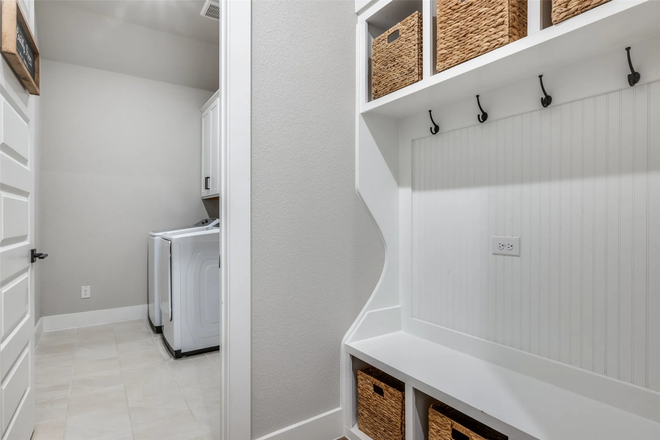 The mud room is just off the garage and conveniently located next to the laundry room. No muddy shoes in the house!