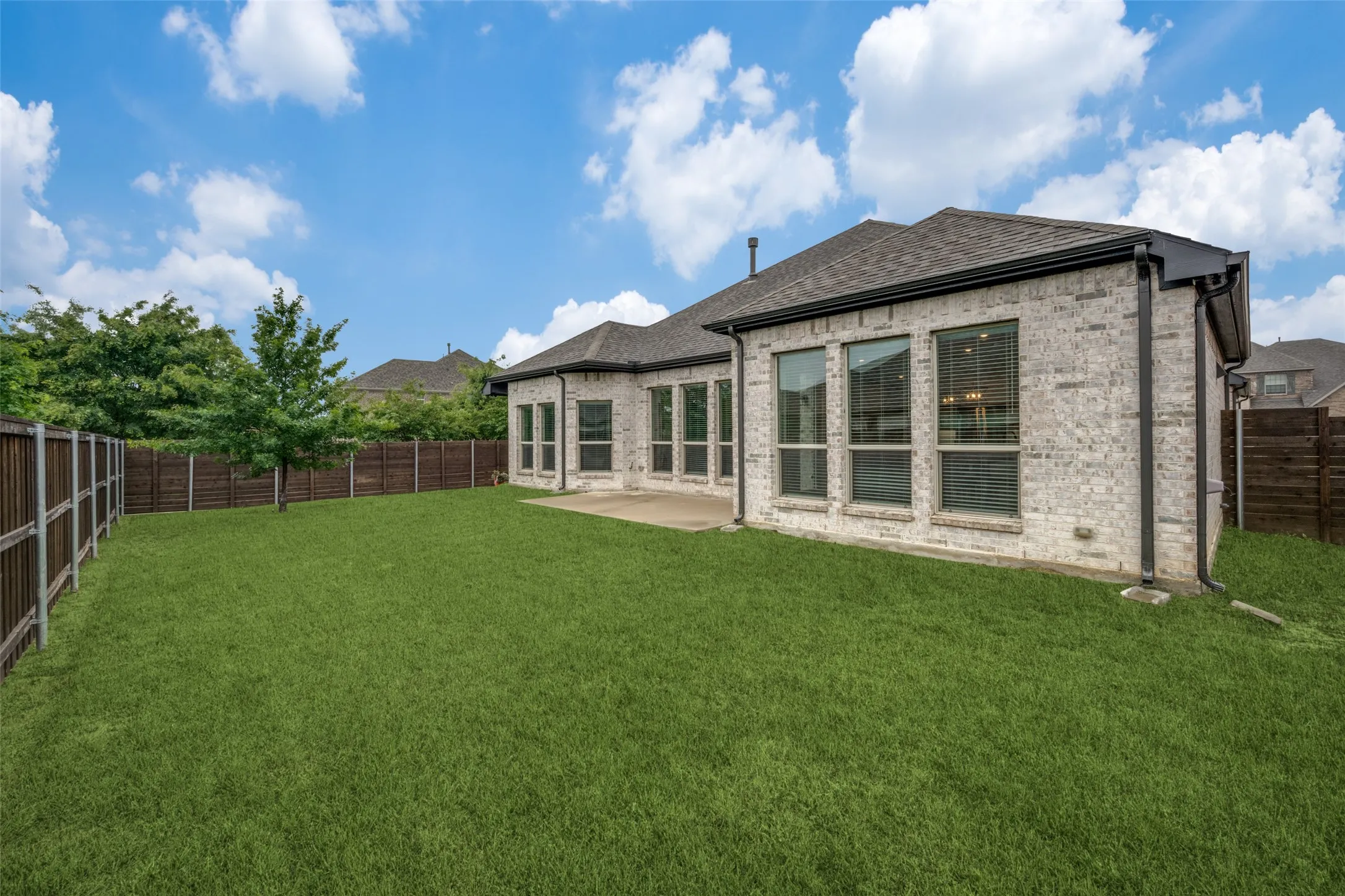 A corner lot with wooden privacy fences that are in excelllent condition.