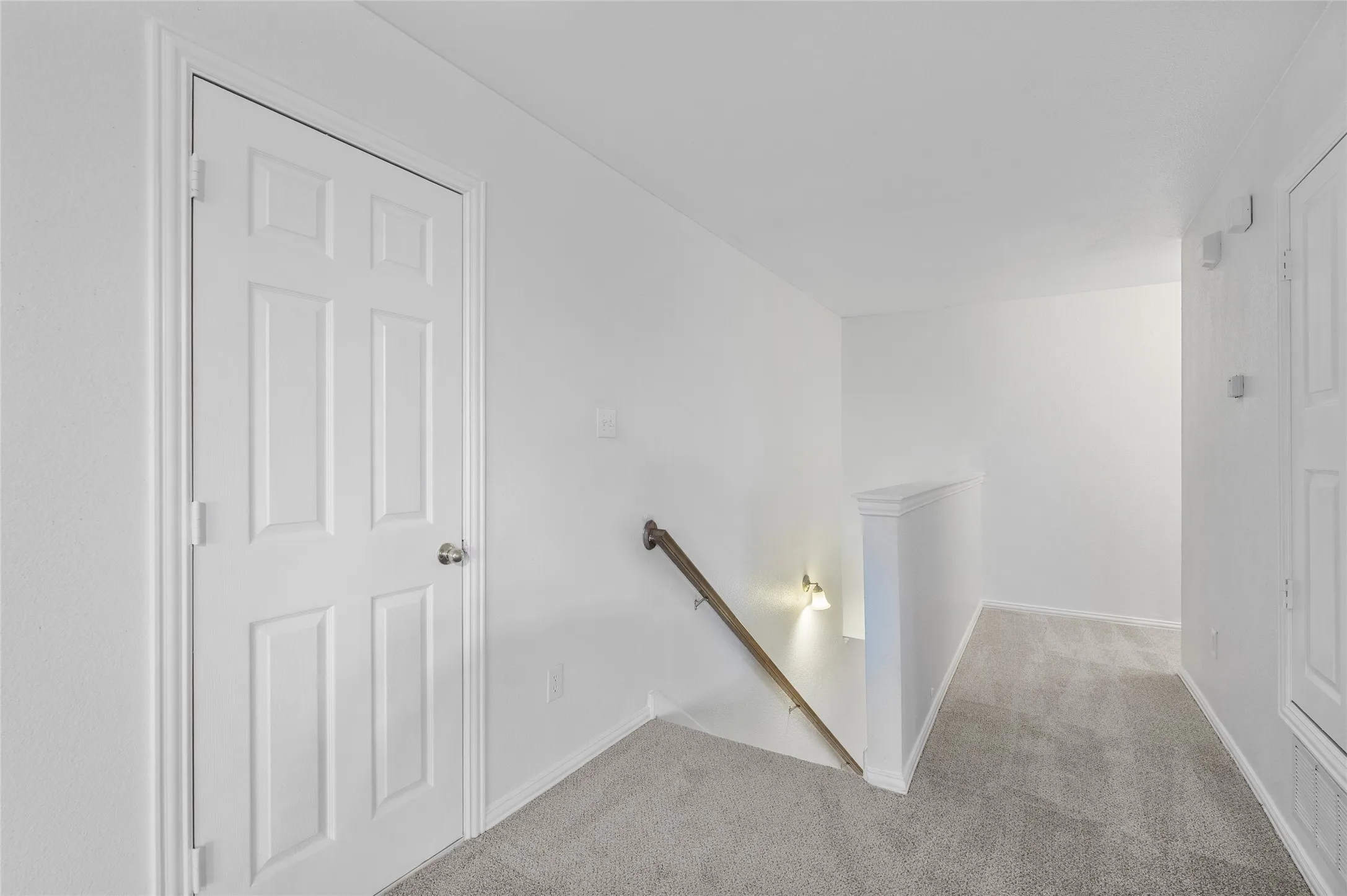Walk in attic access through this door