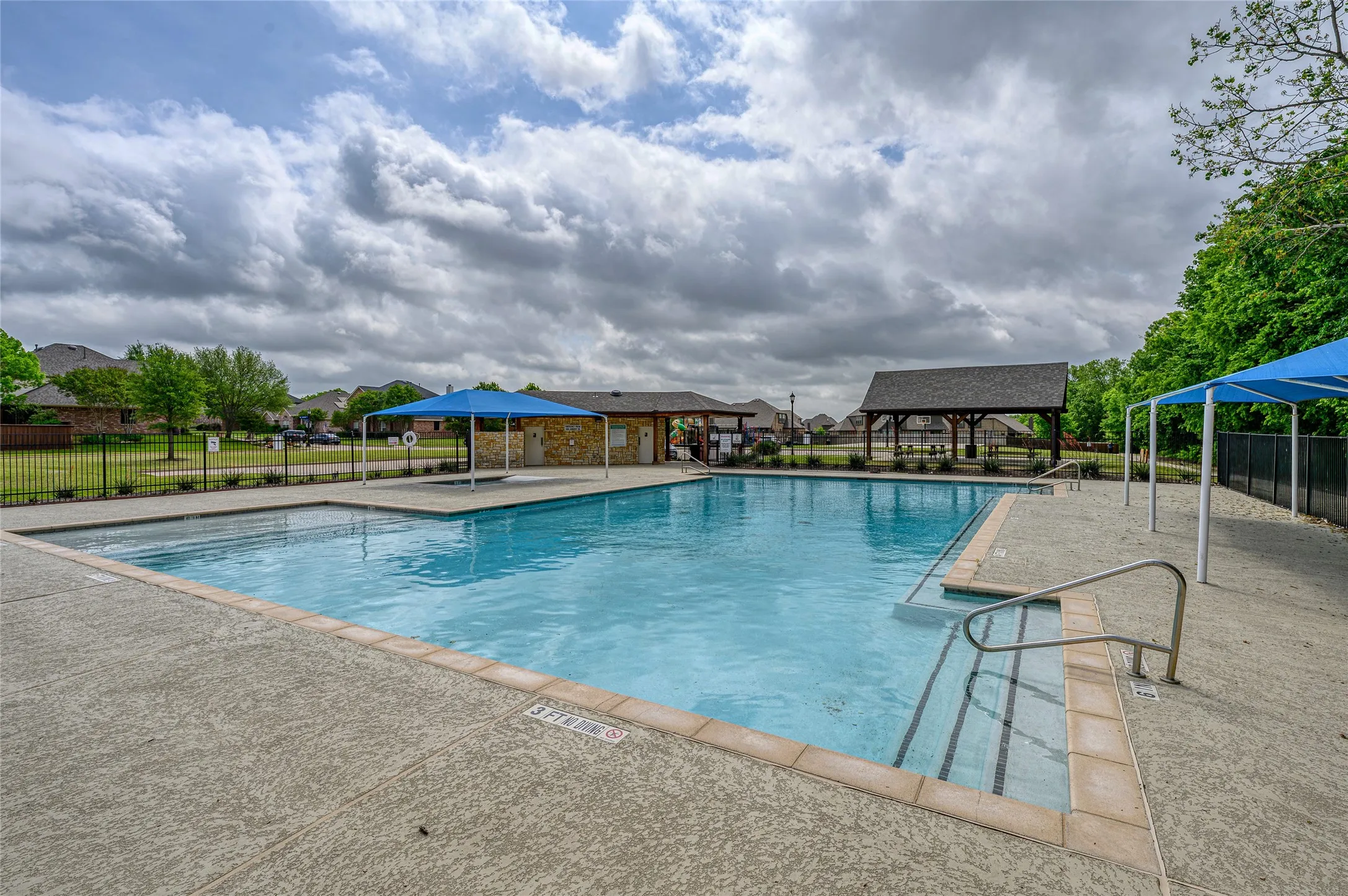 Community pool is just around the corner from the home.