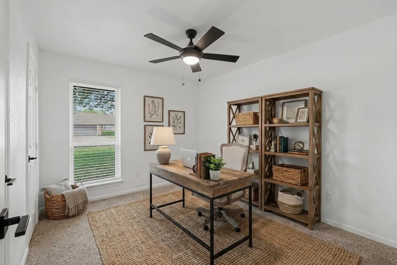 Virtually staged home office / flex room with natural light