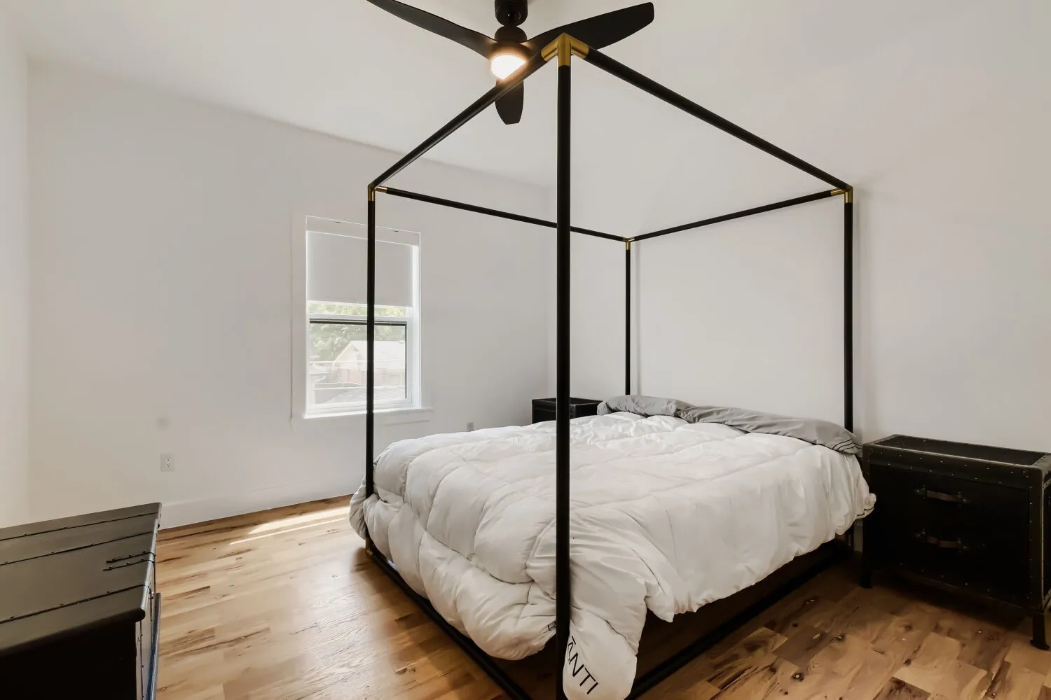Bedroom with light wood-type flooring and ceiling fan
