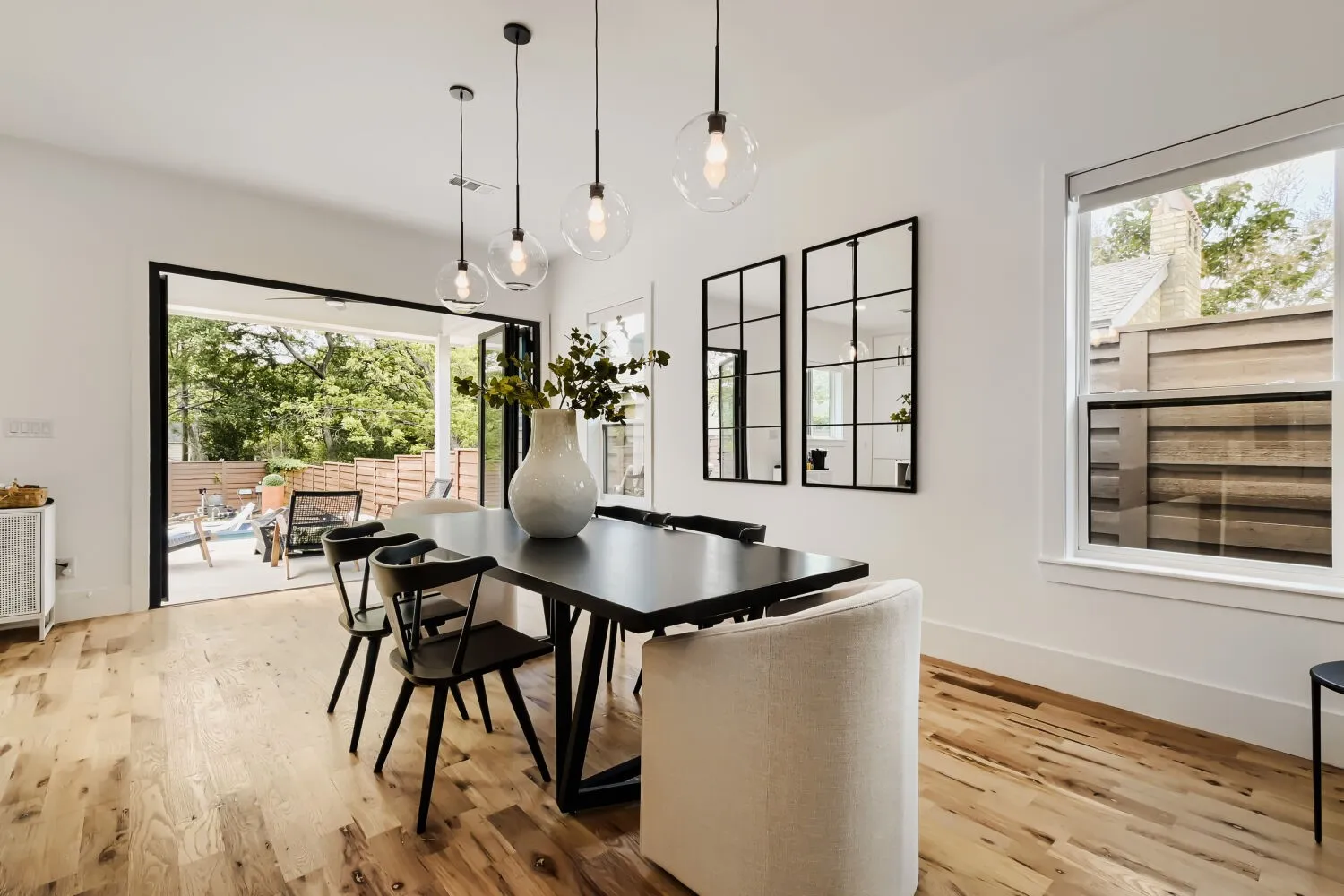 Dining area with light wood-type flooring and baseboards