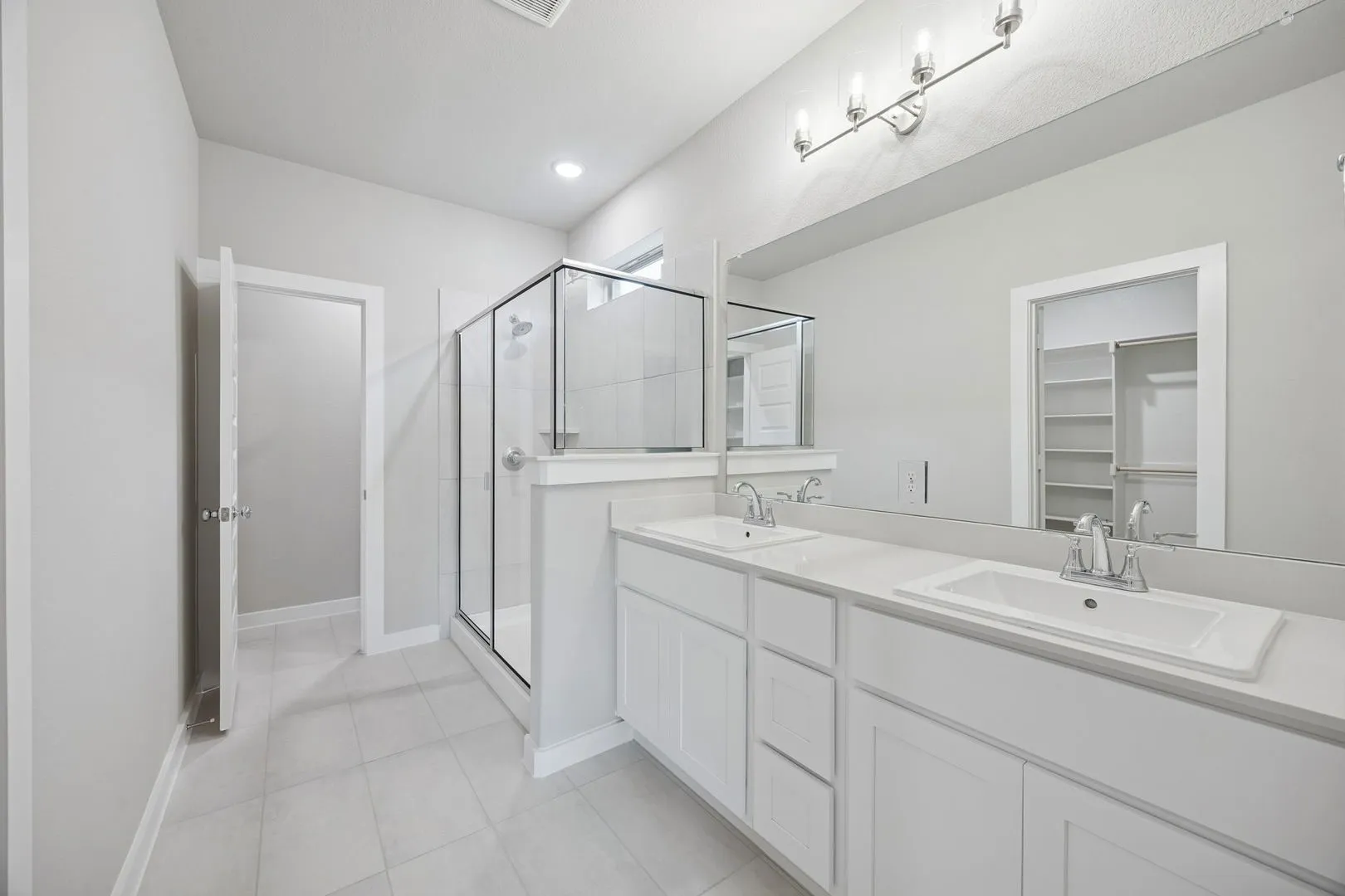 Primary Bathroom in the Stanley II home plan by Trophy Signature Homes – REPRESENTATIVE PHOTO