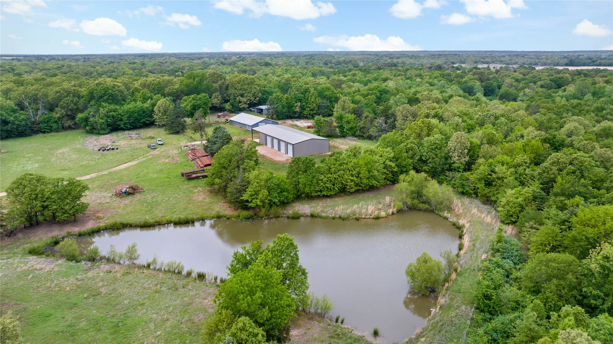 Farm For Sale in Lamar County , 10860 Farm Road 197, Arthur City, Texas 75411, 3 Bedroom, 2 Bathroom, 2 Garage spaces, 1,560 Sqft, built in 2013, Price $3,900,000, mls#21242876, Real Estate Agent in Arthur City, Homes For Sale in Lamar county, Homes For Sale in Arthur City, Realtor in Arthur City Texas, Real Estate Brokerage Independent Realty Texas, Luminita Cordes Realtor
