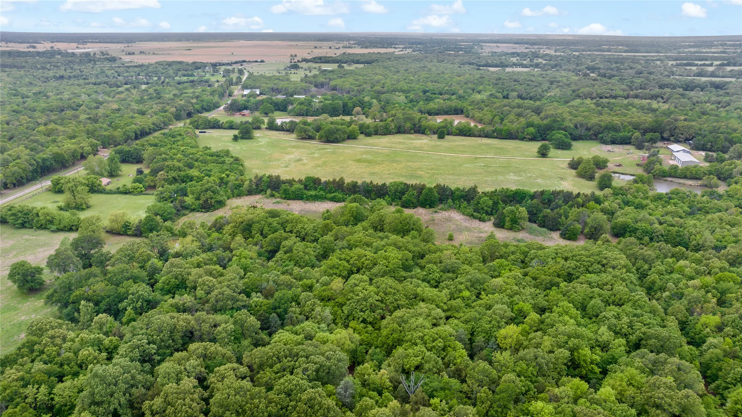 Farm For Sale in Lamar County , 10860 Farm Road 197, Arthur City, Texas 75411, 3 Bedroom, 2 Bathroom, 2 Garage spaces, 1,560 Sqft, built in 2013, Price $3,900,000, mls#21242876, Real Estate Agent in Arthur City, Homes For Sale in Lamar county, Homes For Sale in Arthur City, Realtor in Arthur City Texas, Real Estate Brokerage Independent Realty Texas, Luminita Cordes Realtor