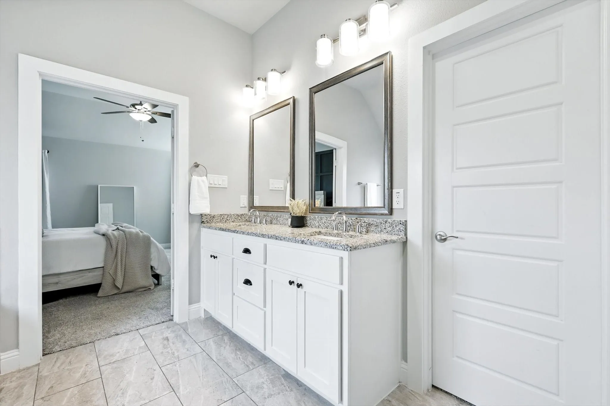 Primary bathroom, with dual sinks.