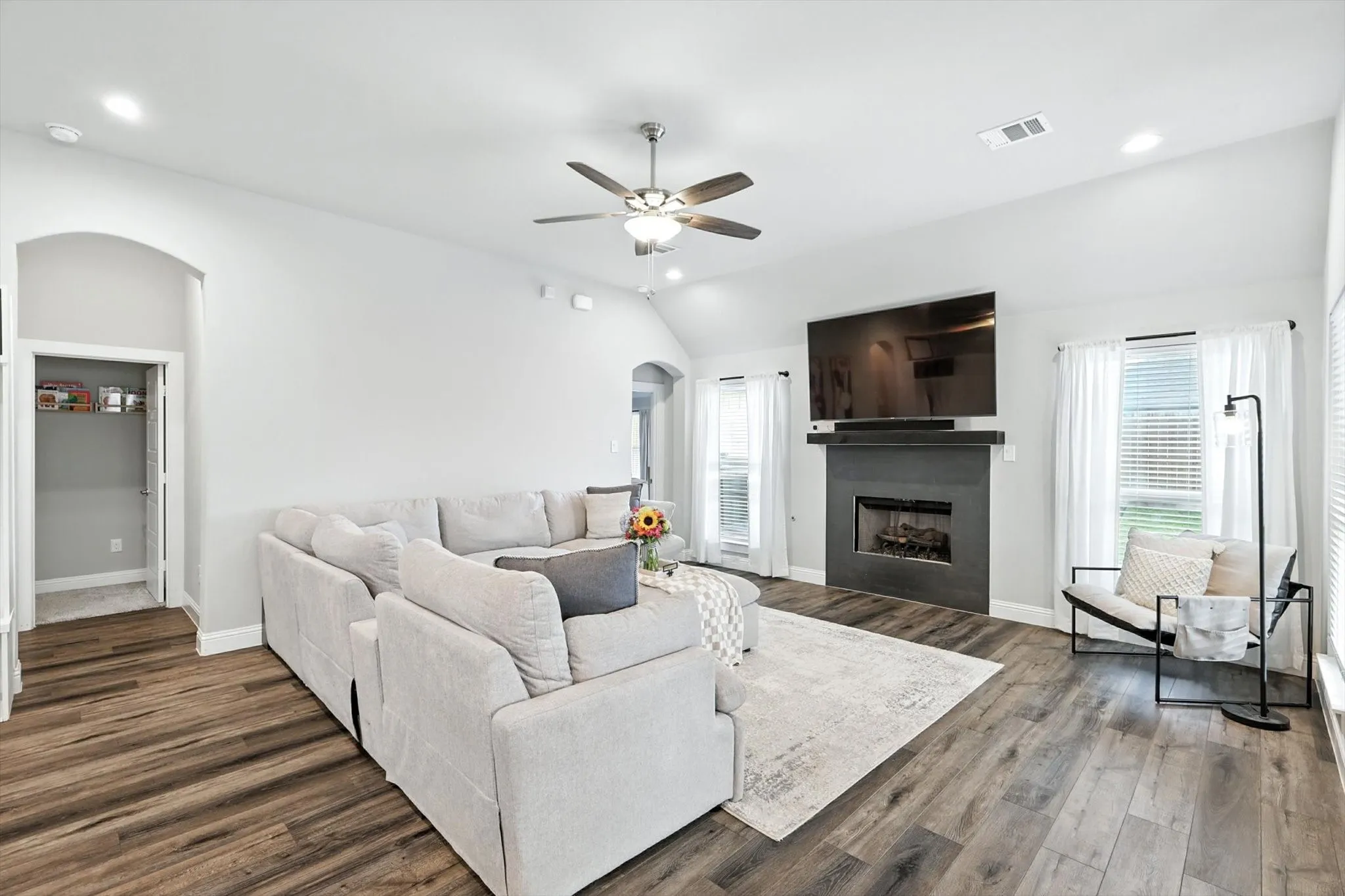 Gorgeous, durable flooring and cozy fireplace perfect for cozy nights in.
