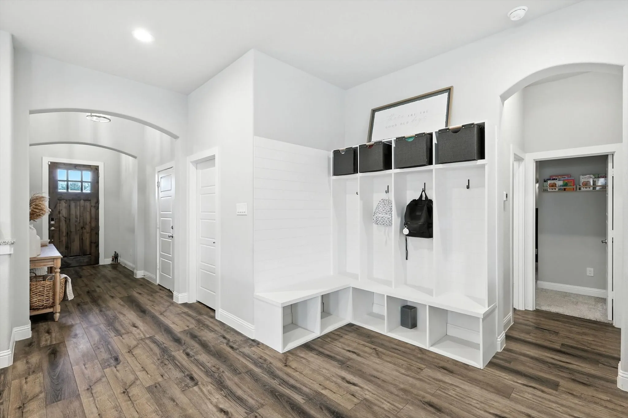 Beautiful built-ins perfect for storing all your shoes, handbags, backpacks, etc.